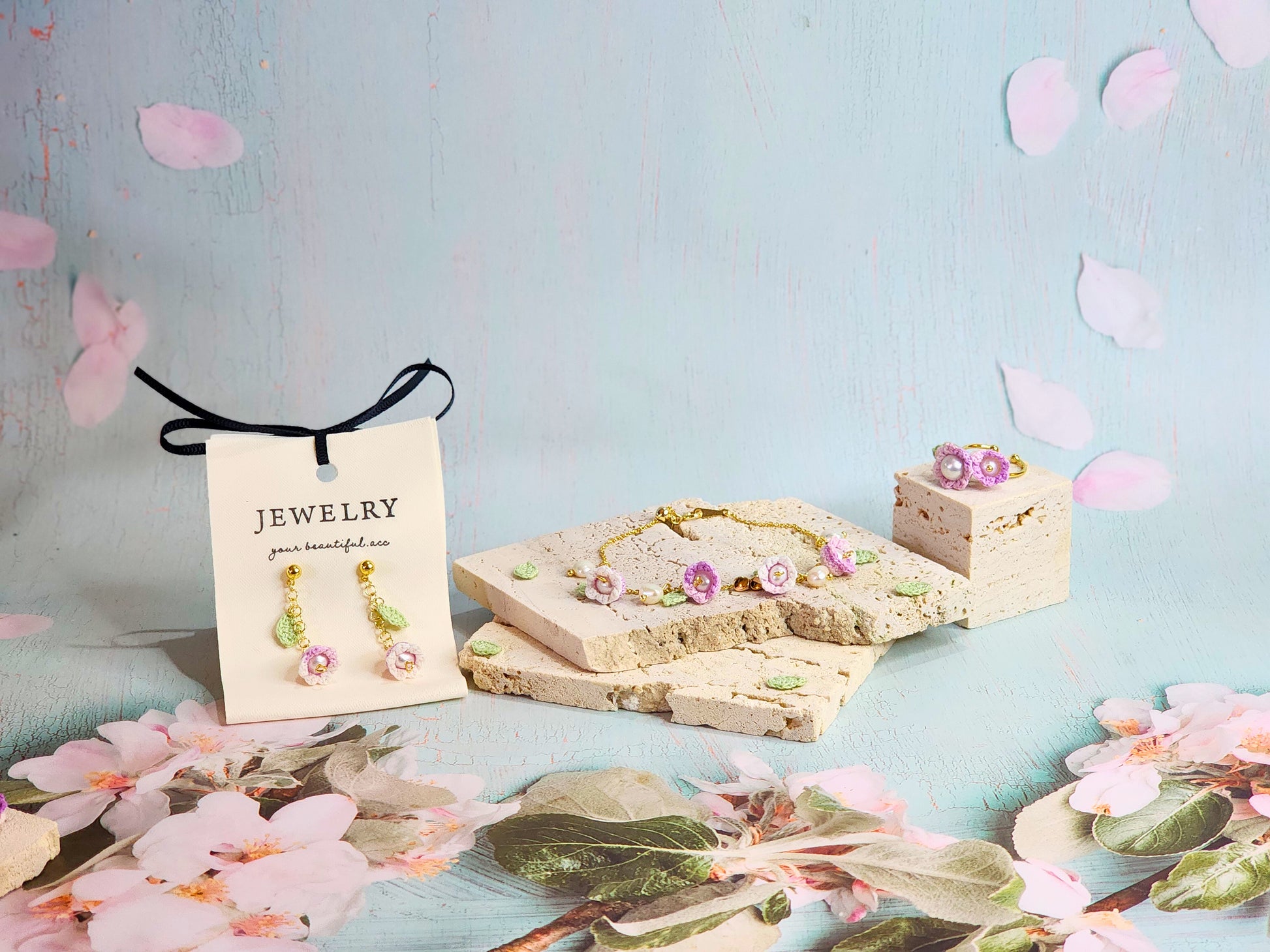 Collection of handcrafted white-pink micro-crochet Lily of the Valley with pearls earrings, bracelet and ring. 18K gold-plated.