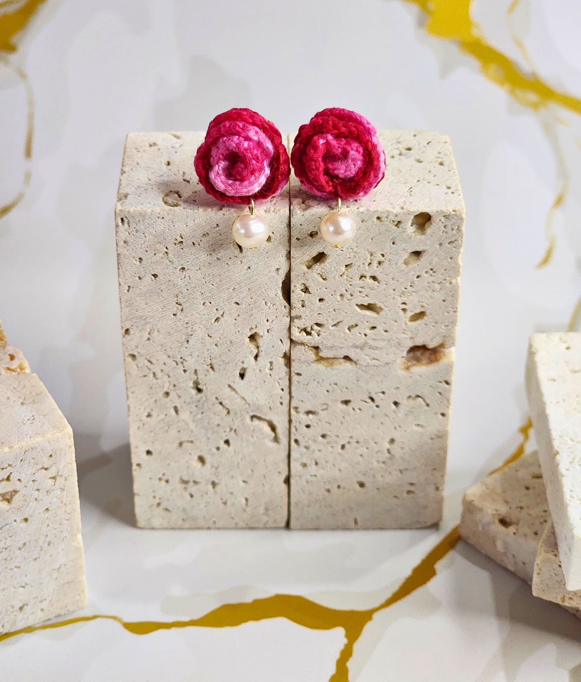 A pair of Rose with Freshwater Pearls Micro-crochet Earrings