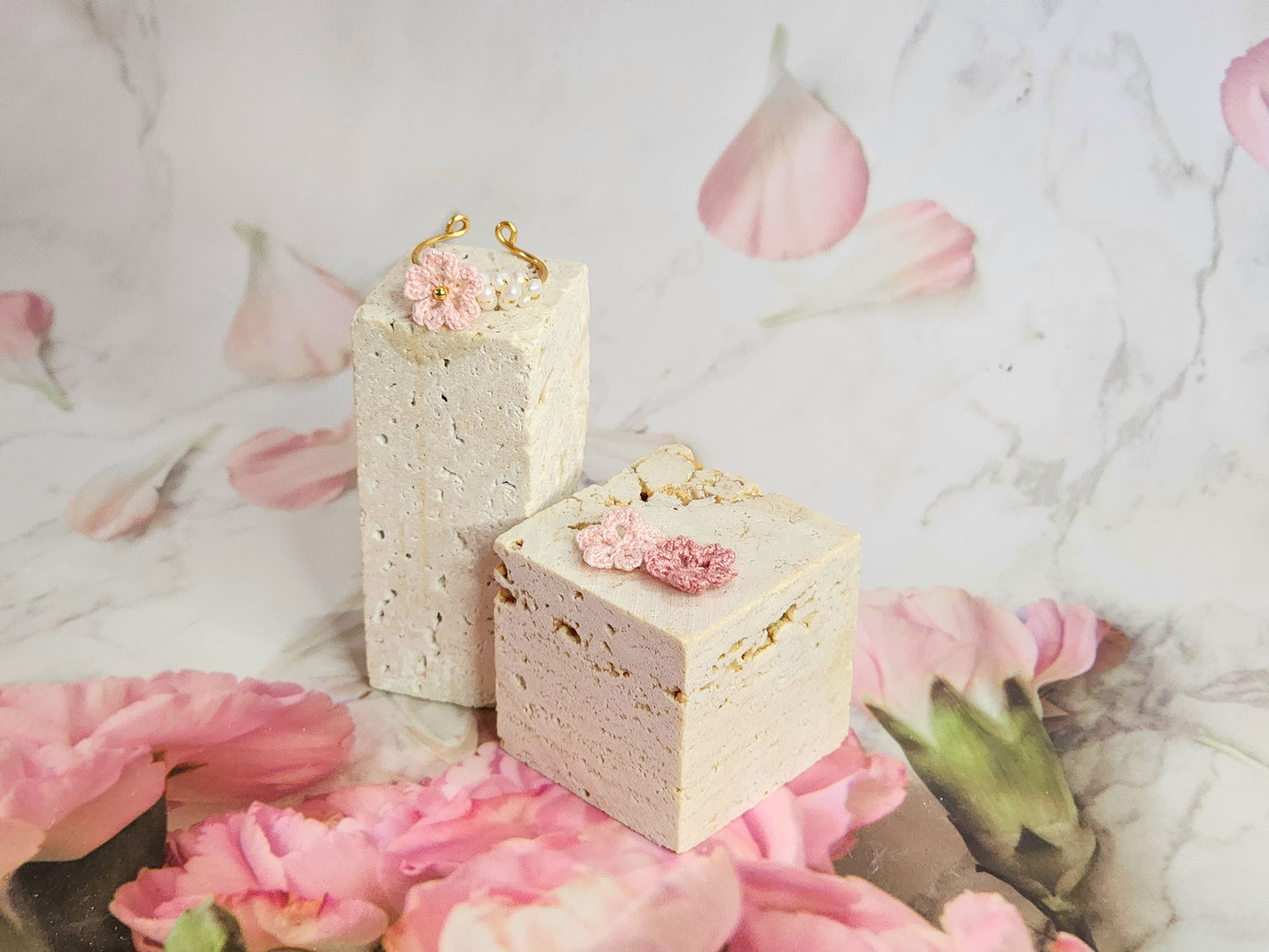 Band of natural freshwater pearls ring adorned with a delicately handcrafted micro‑crochet Sakura. 18K gold-plated adjustable ring.