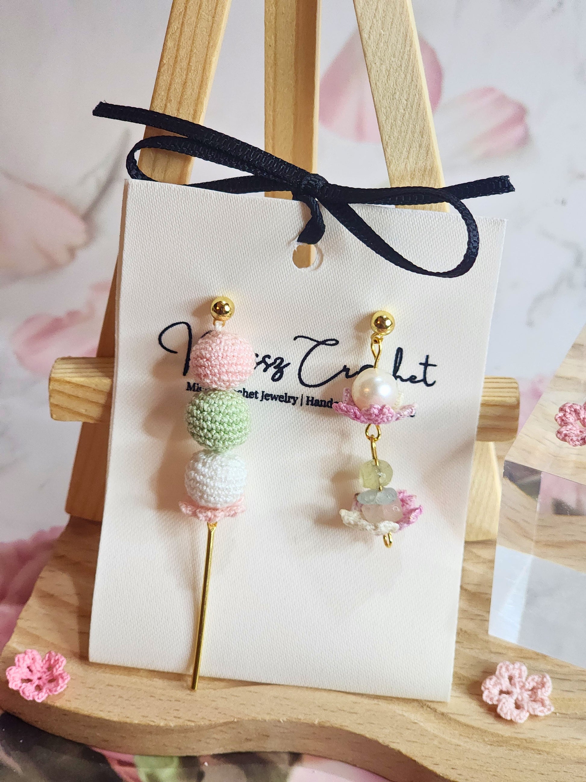 Handcrafted asymmetrical Dango & Sakura micro-crochet earrings. Adorned with natural freshwater pearl and morganite crystals