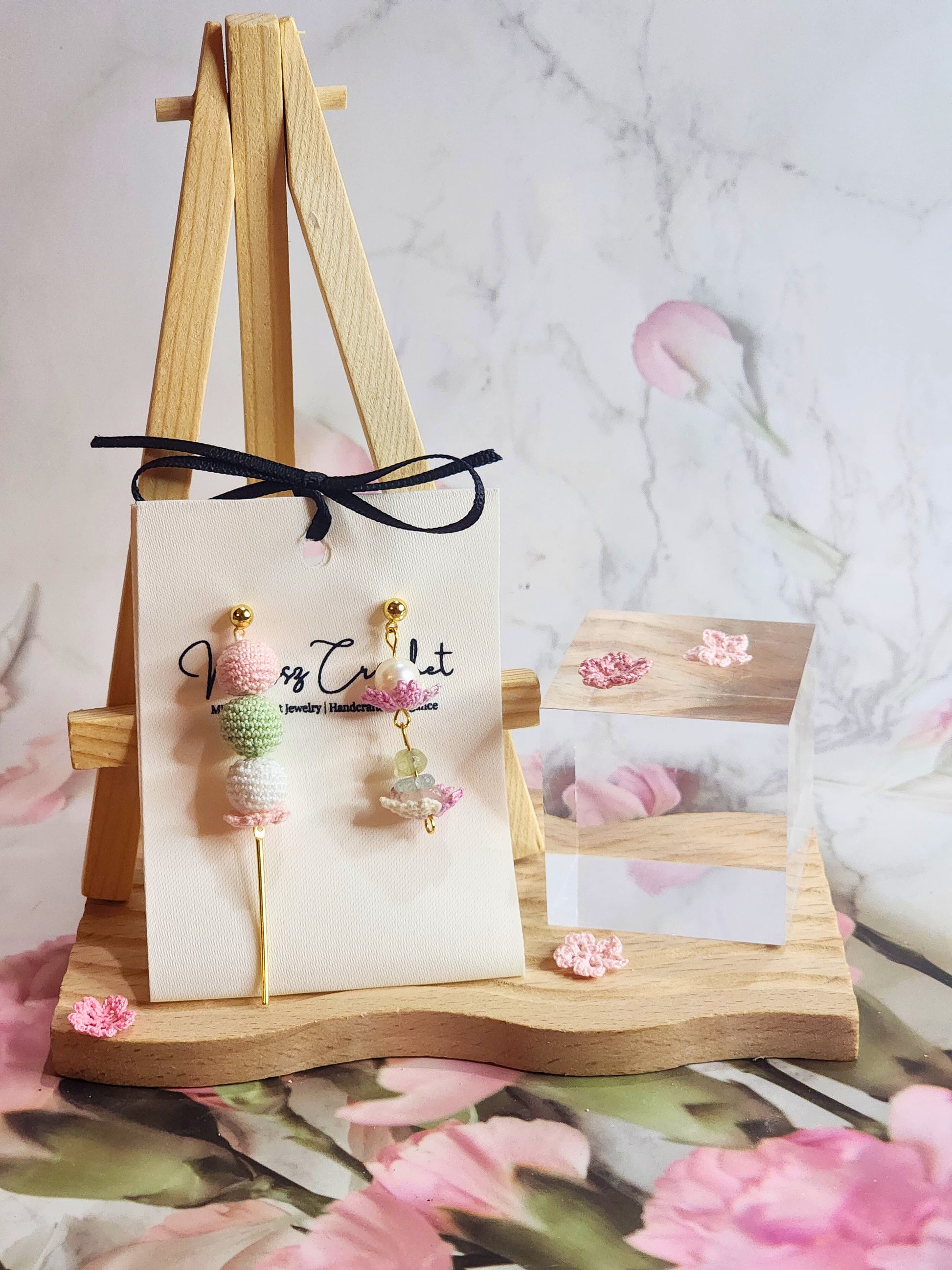 Handcrafted asymmetrical Dango & Sakura micro-crochet earrings. Adorned with natural freshwater pearl and morganite crystals