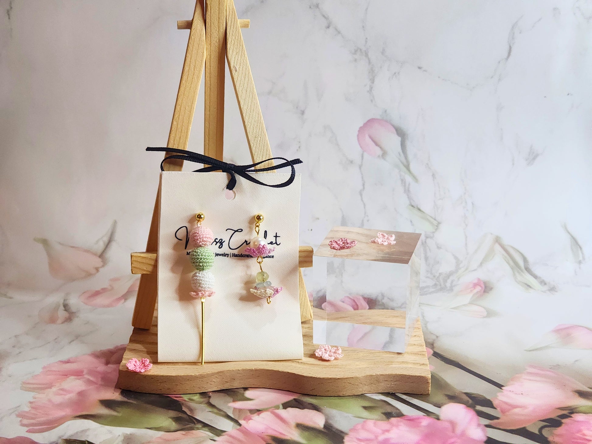 Handcrafted asymmetrical Dango & Sakura micro-crochet earrings. Adorned with natural freshwater pearl and morganite crystals