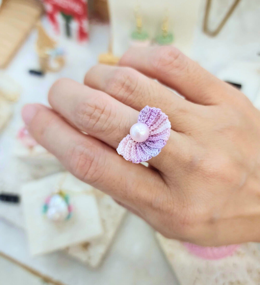 Handcrafted micro-crochet seashell ring with lustrous 6-7mm pink natural freshwater pearl on 14K gold-plated adjustable band