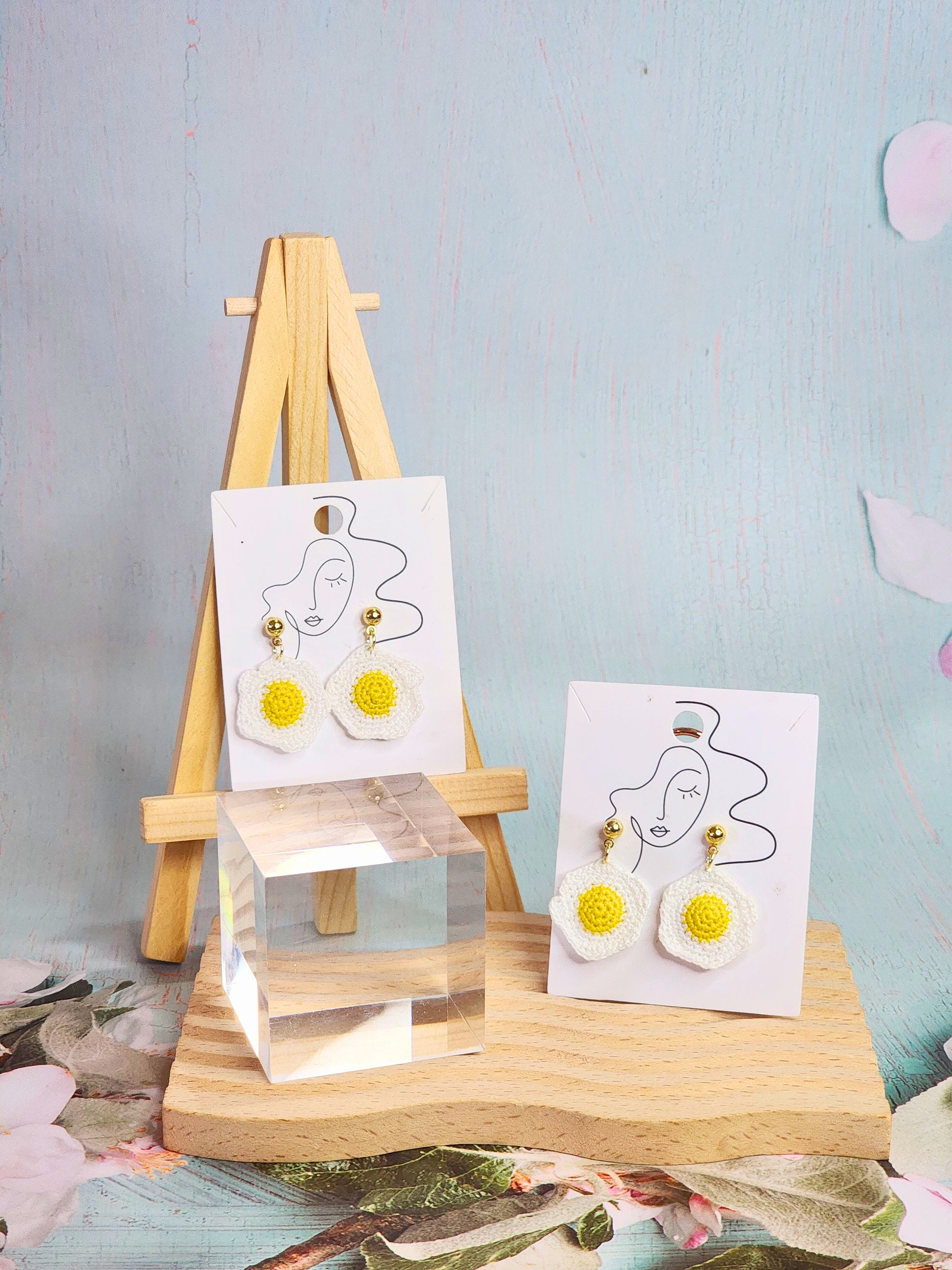 Pair of cute & whimiscal fried egg micro-crochet earrings. Handcrafted with ultra-fine lace yarn and paired with sterling silver hooks