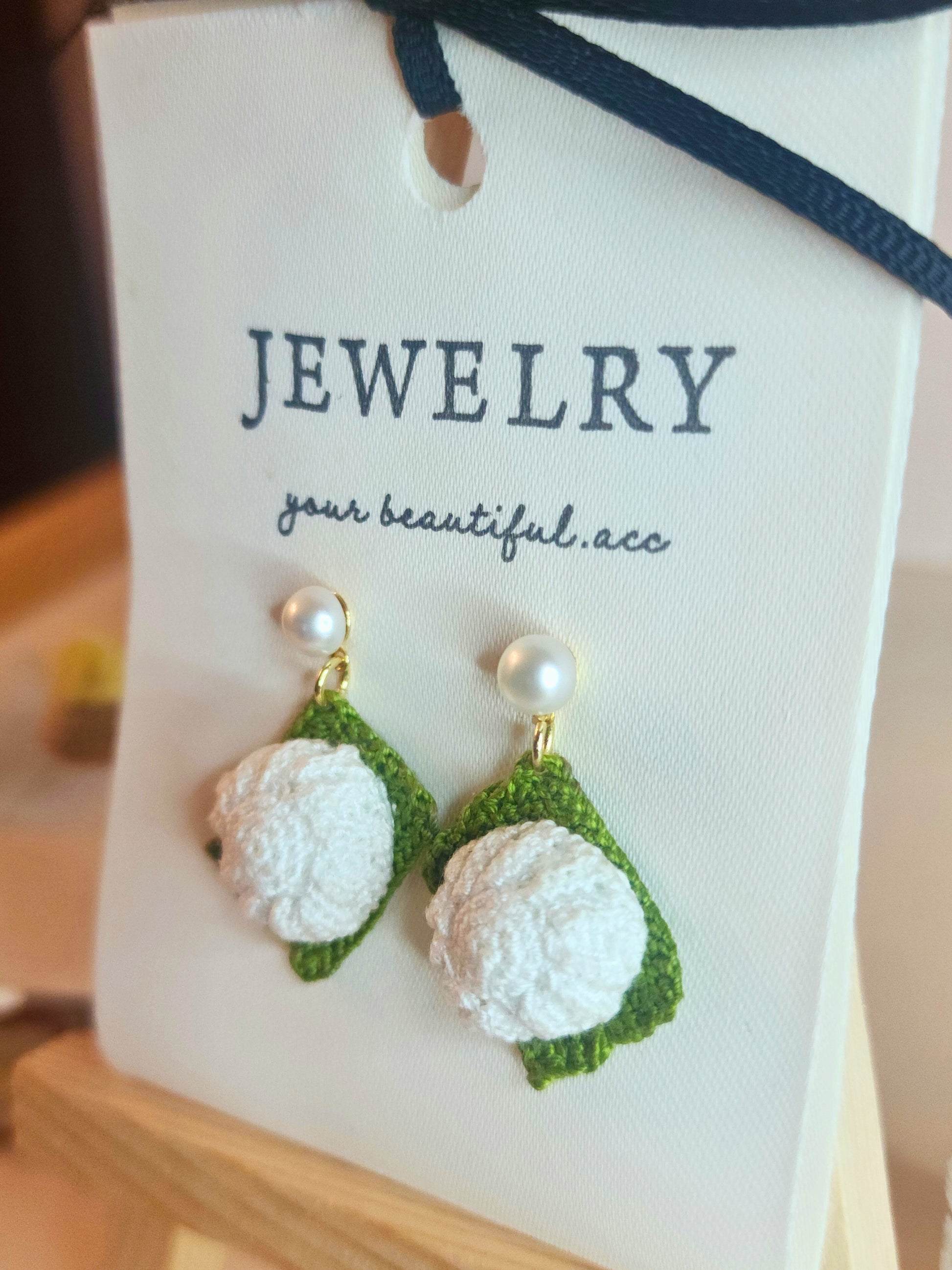 Kueh Tu Tu micro-crochet earrings adorned with 4-5mm AAA grade natural freshwater pearls and paired with 18KGP ear studs