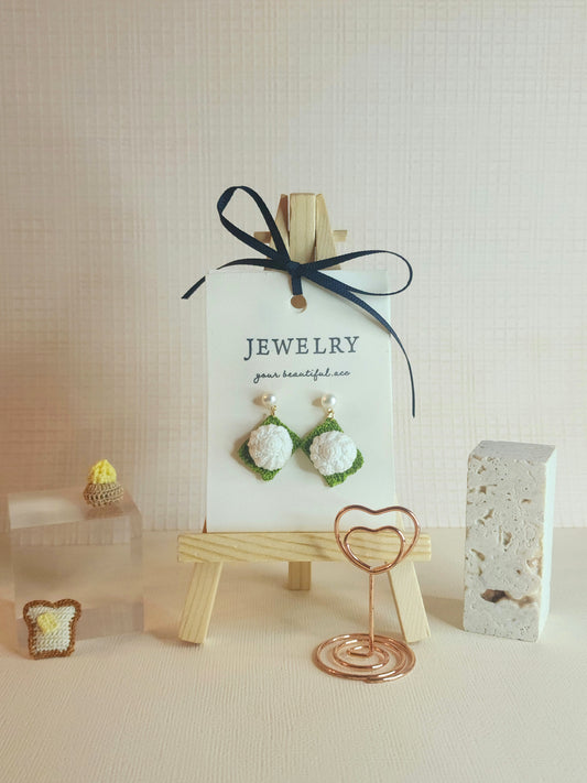 Kueh Tu Tu micro-crochet earrings adorned with 4-5mm AAA grade natural freshwater pearls and paired with 18KGP ear studs
