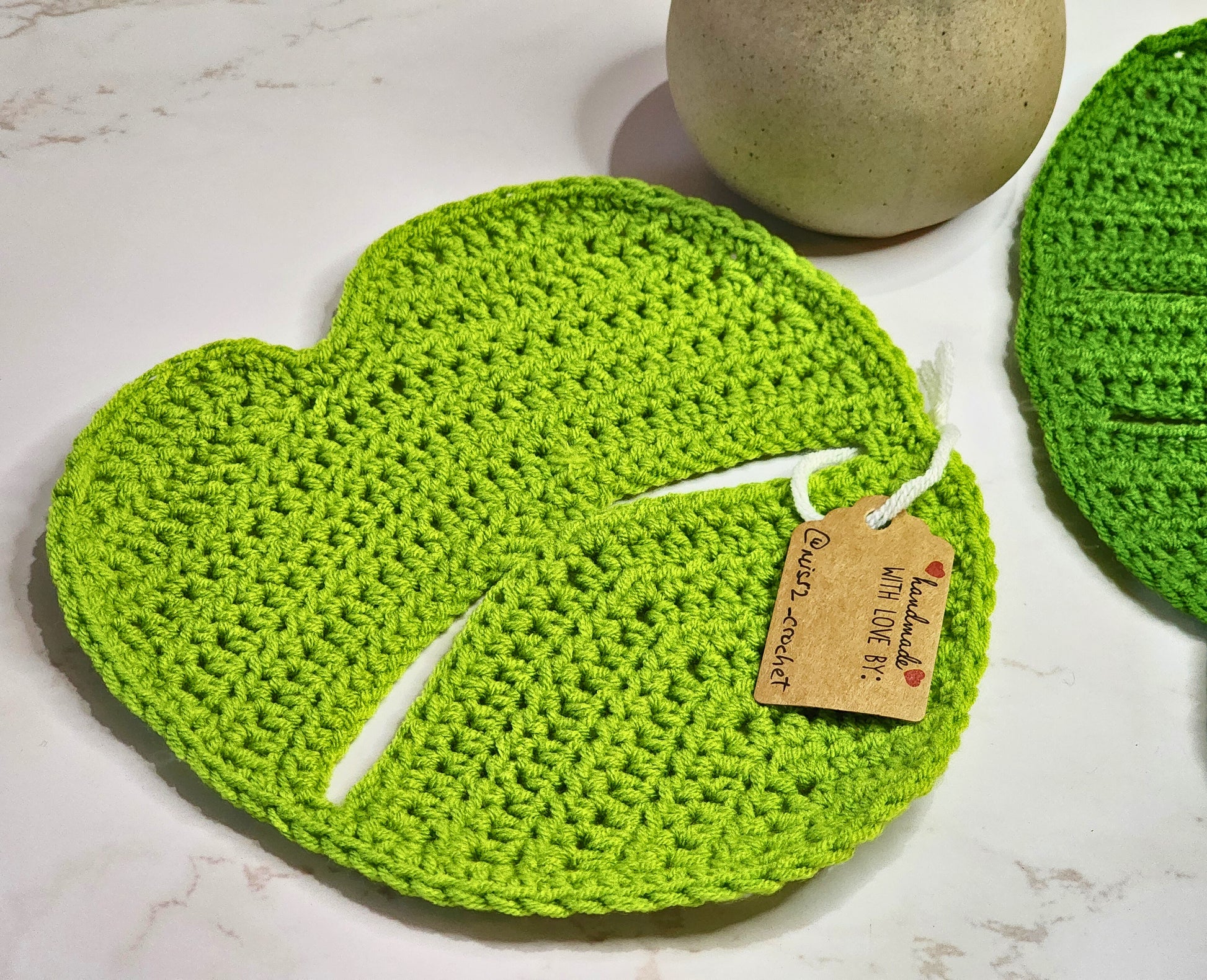 Monstera crocheted table decor in forest green