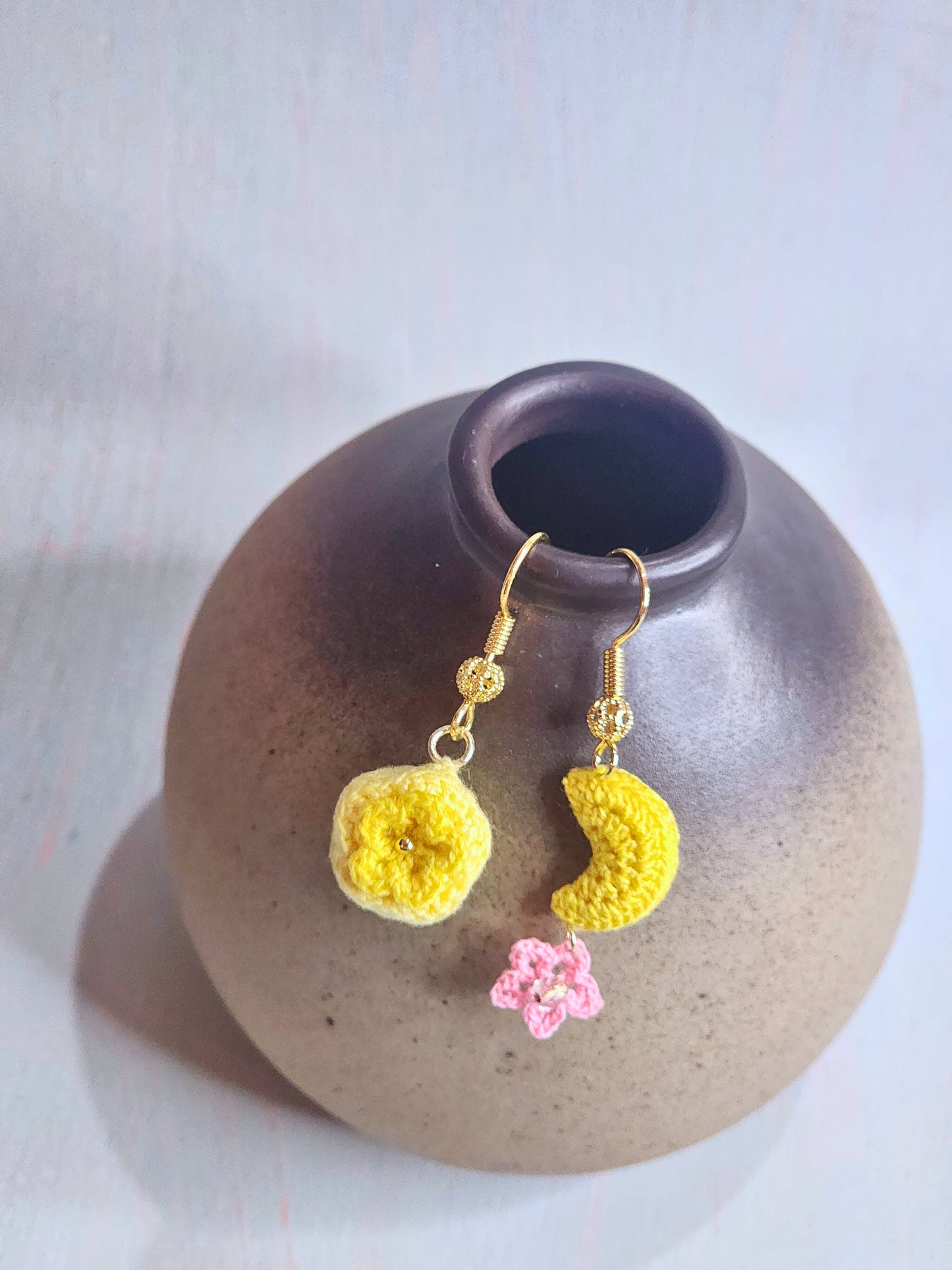 Handcrafted Autumn Moon & Mooncake Micro-crochet earrings. Set with 18K gold-plated ear hooks.