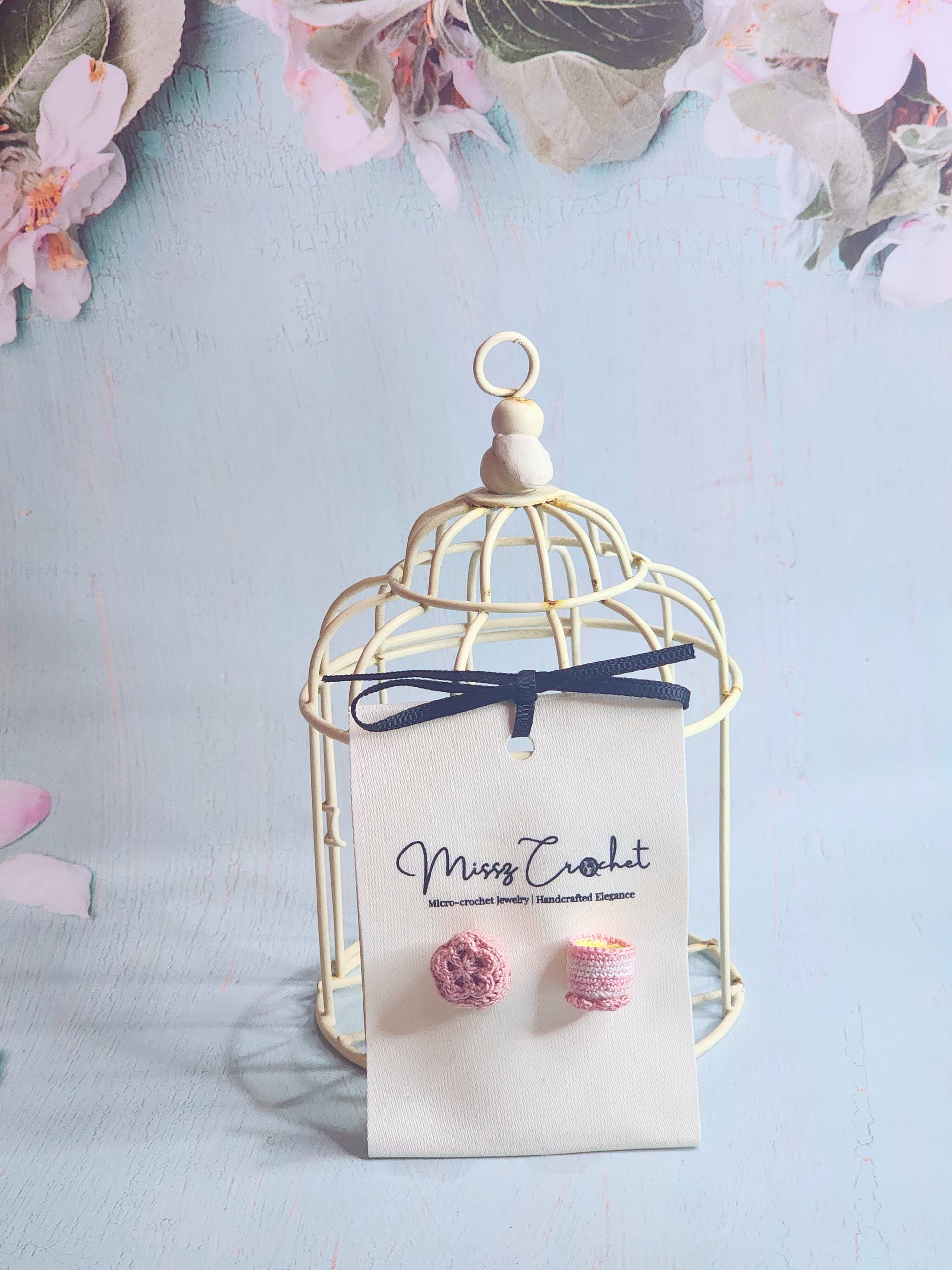 Handcrafted micro-crochet earrings featuring a mooncake & jasmine tea. 18K gold-plated ear hooks.