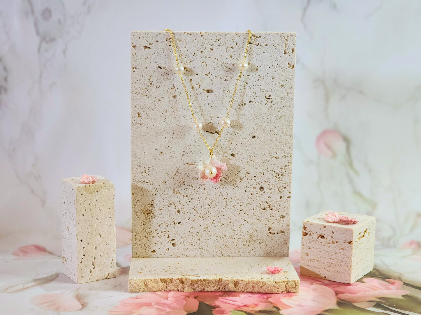 Freshwater Pearls Choker with Micro-crochet Sakura & Pearl pendant. Handcrafted and paired with an 18K gold-plated chain.