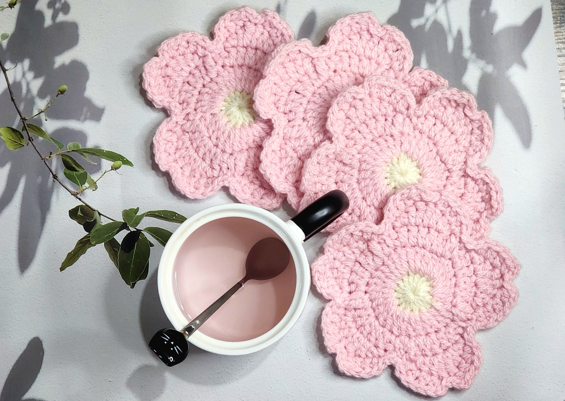 Set of 4 pink sakura crochet coasters