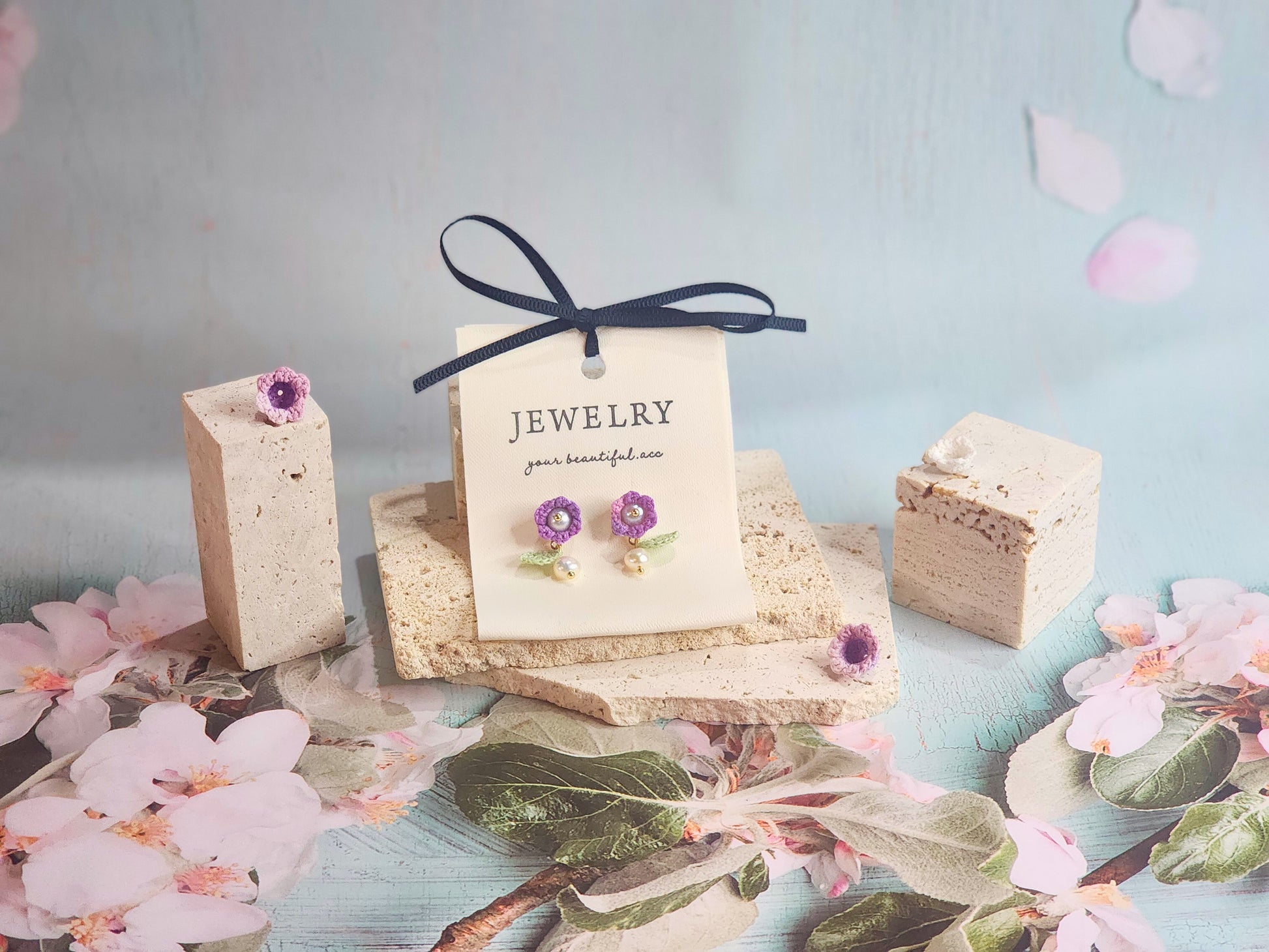 Handcrafted purple micro-crochet Lily of the Valley earrings, adorned witb 5-5.5mm freshwater pearls and 5-6mm Baroque pearls. 18K gold-plated studs.