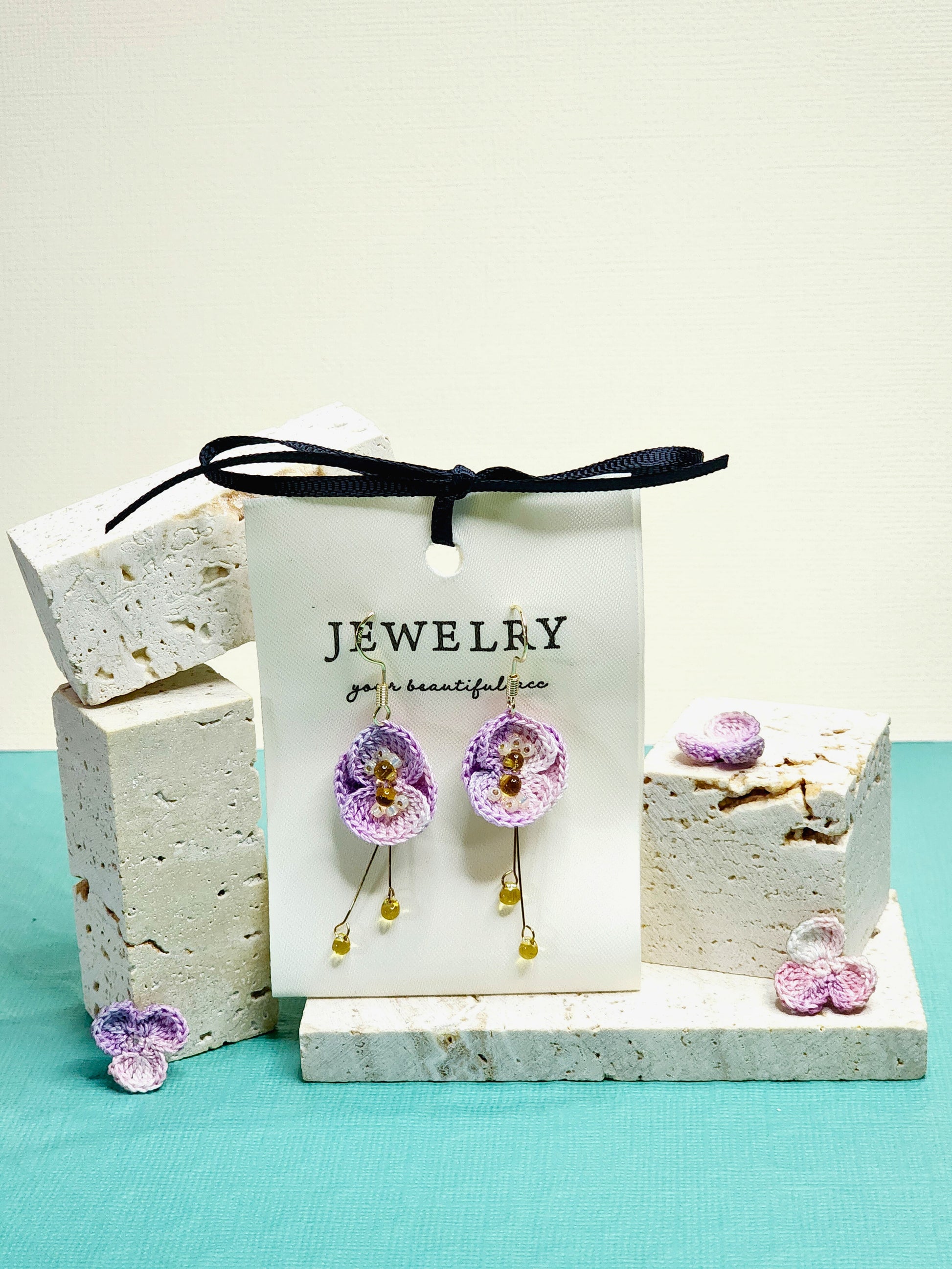 A pair of luxury micro-crochet purple poppy dangle earrings