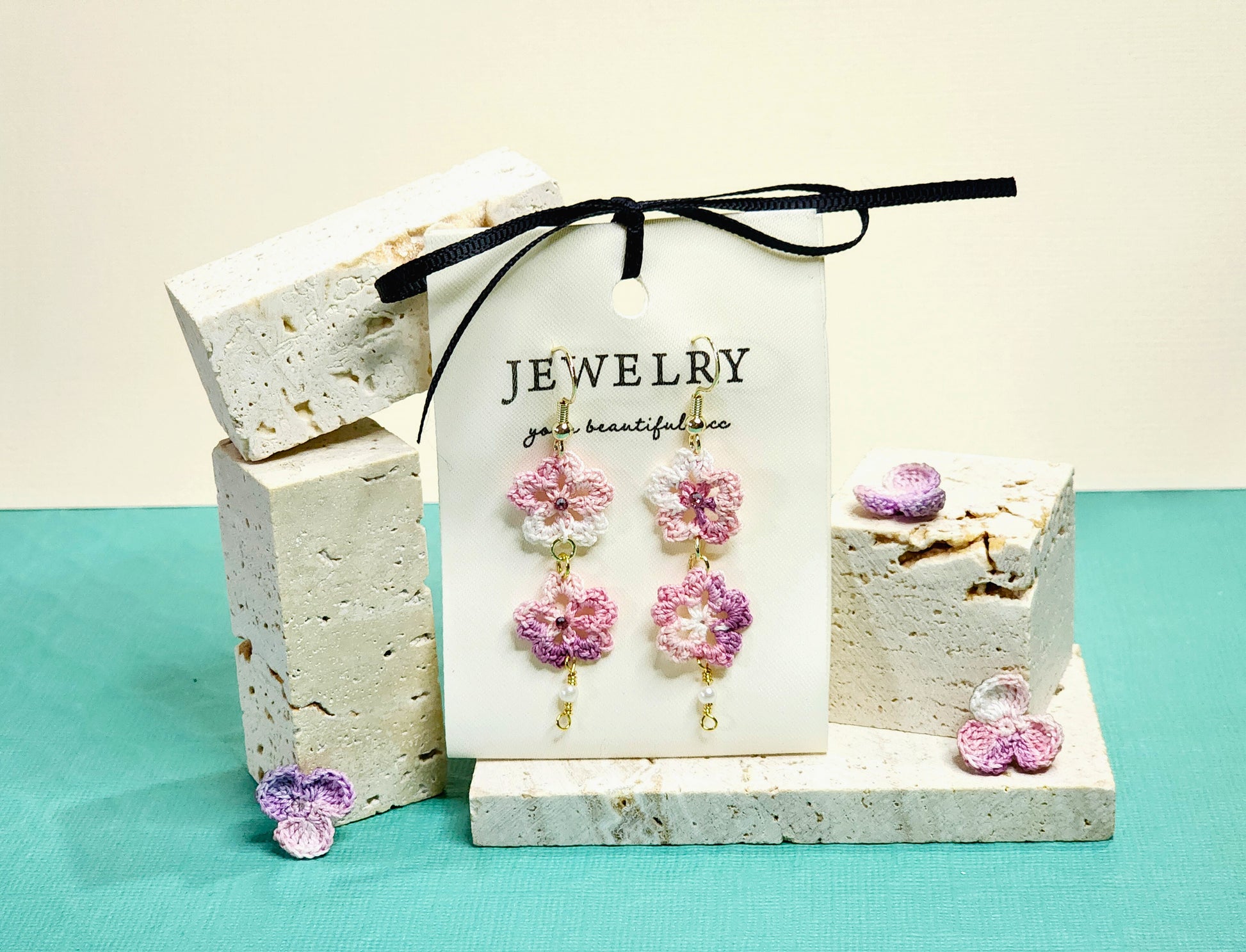 A pair of pink Sakura duo micro-crochet dangle earrings