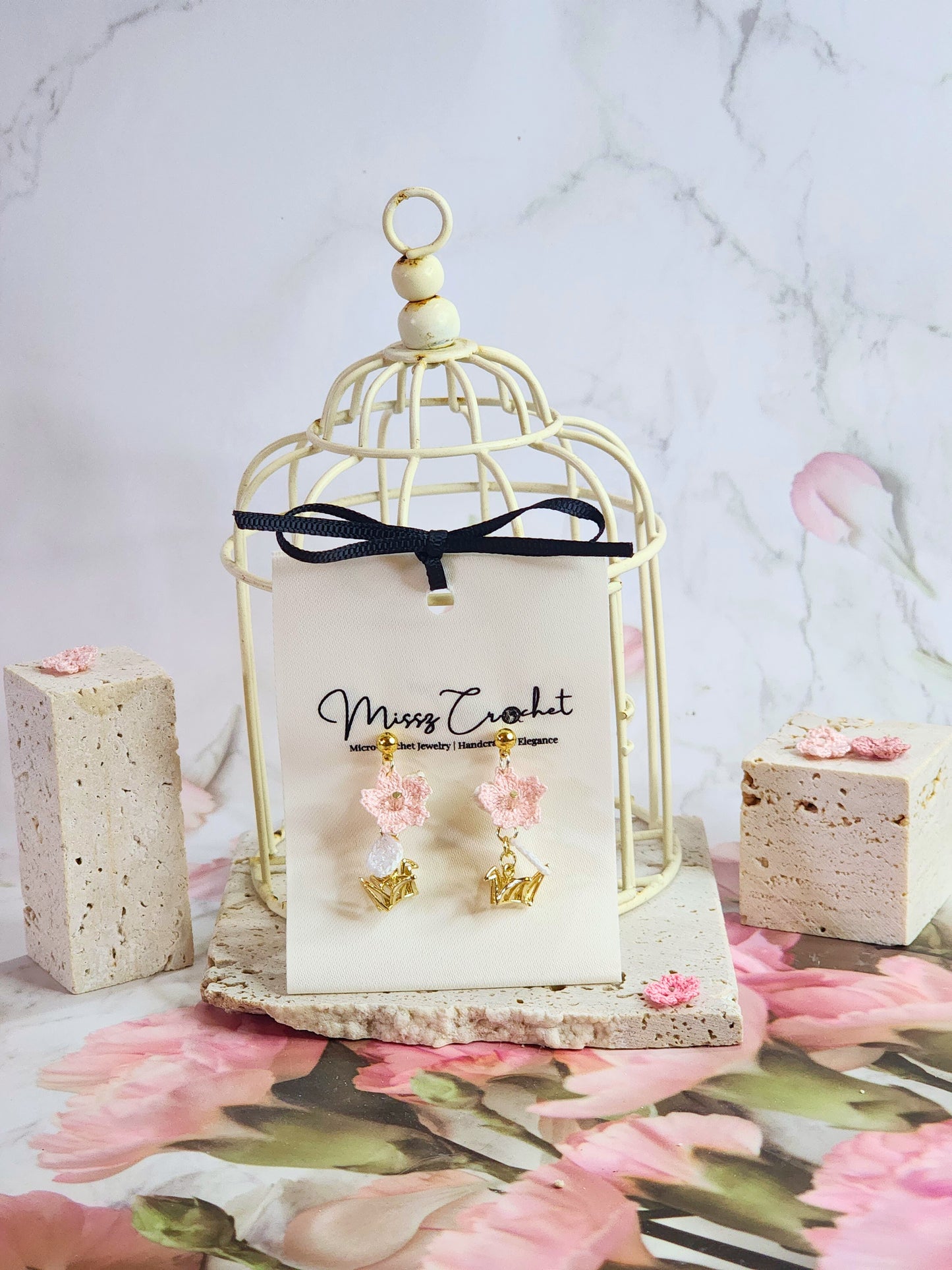 Handcrafted micro-crochet Sakura blossoms accented with Czech Crystals and gold-plated cranes on 18K gold-plated ear studs