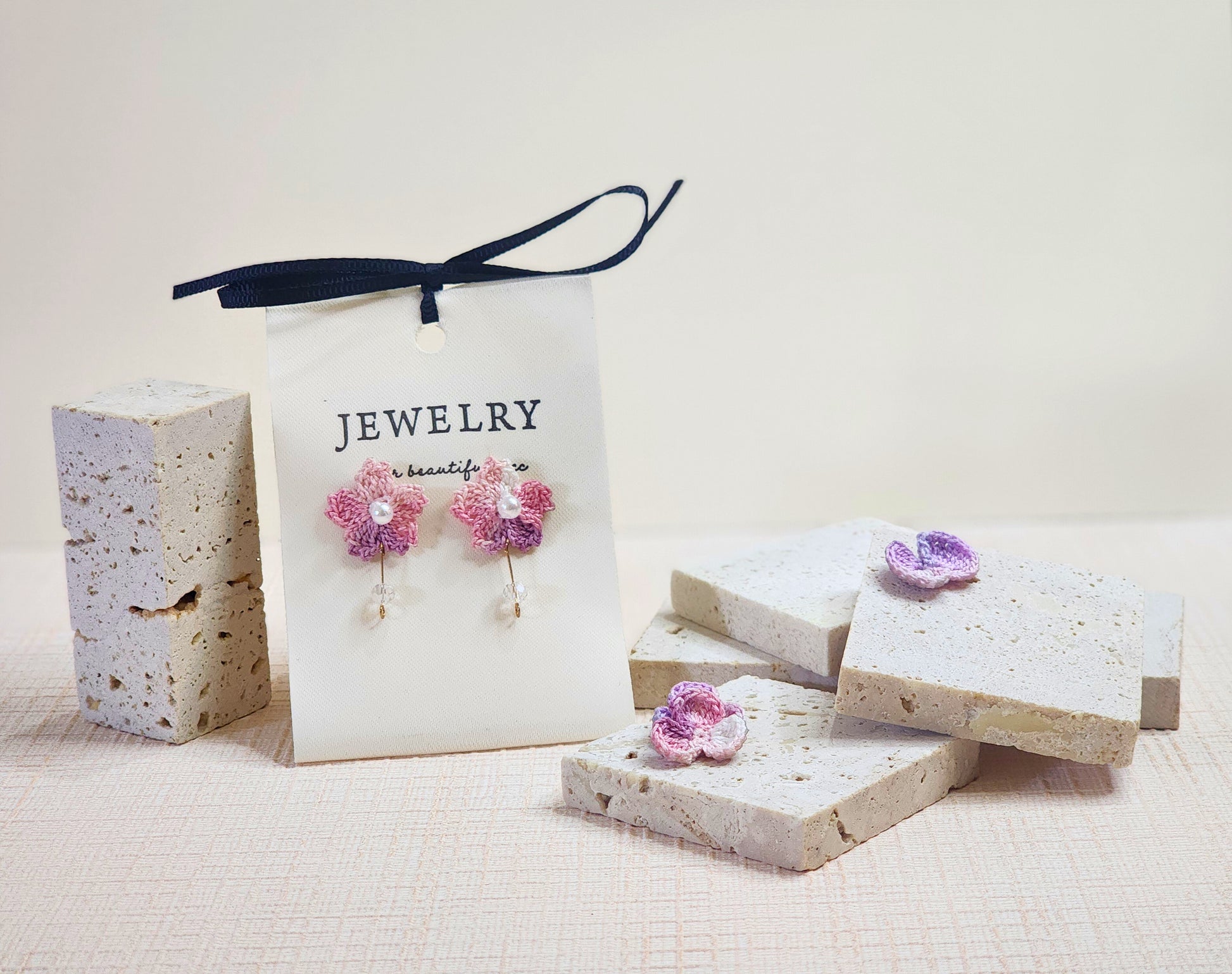 A pair of Sakura with Pearls & Crystals Micro-crochet Earrings
