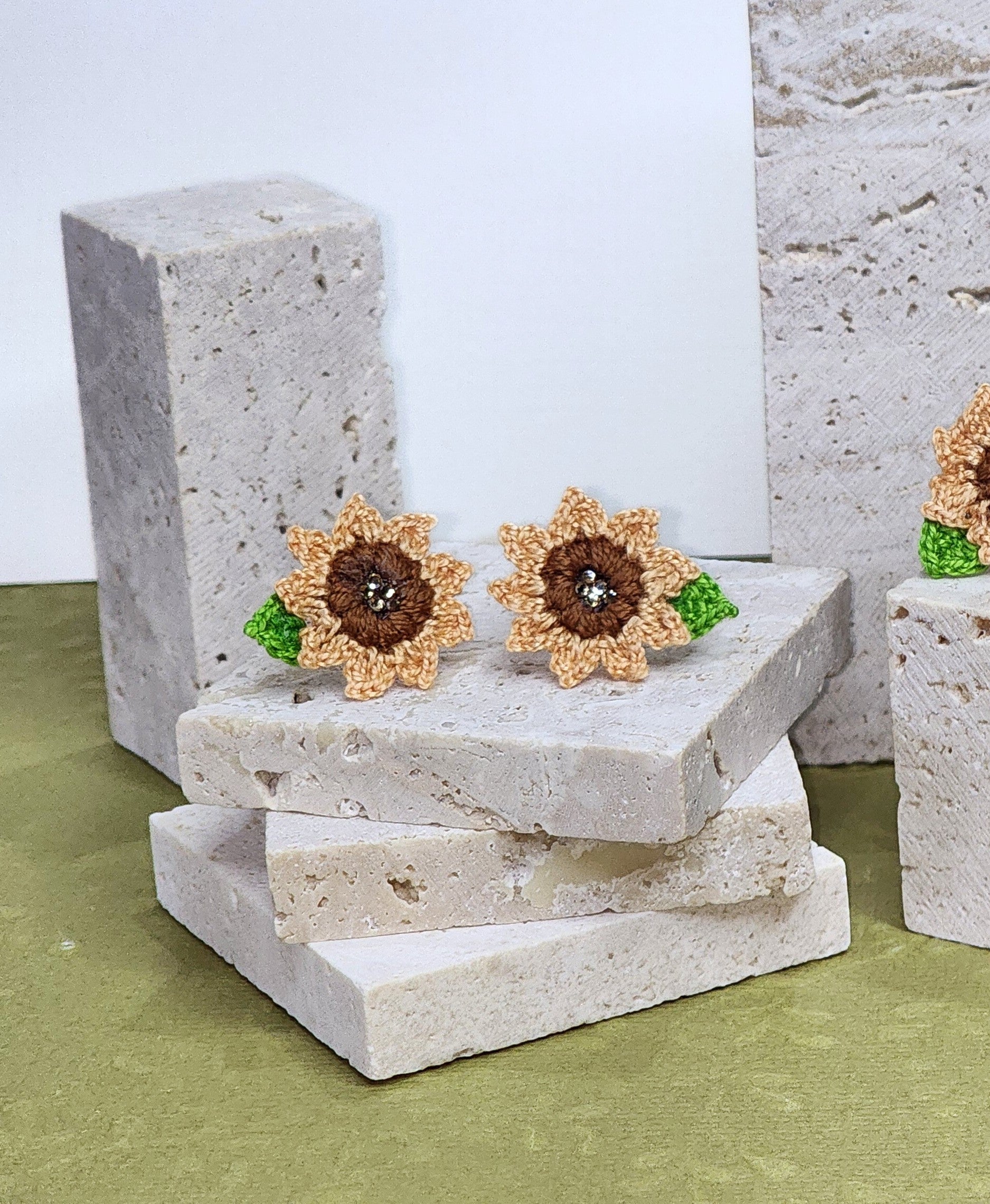 A pair of Sunflower with Swarovski Crystals Micro-crochet Earrings