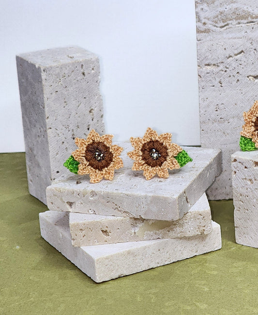 A pair of Sunflower with Swarovski Crystals Micro-crochet Earrings