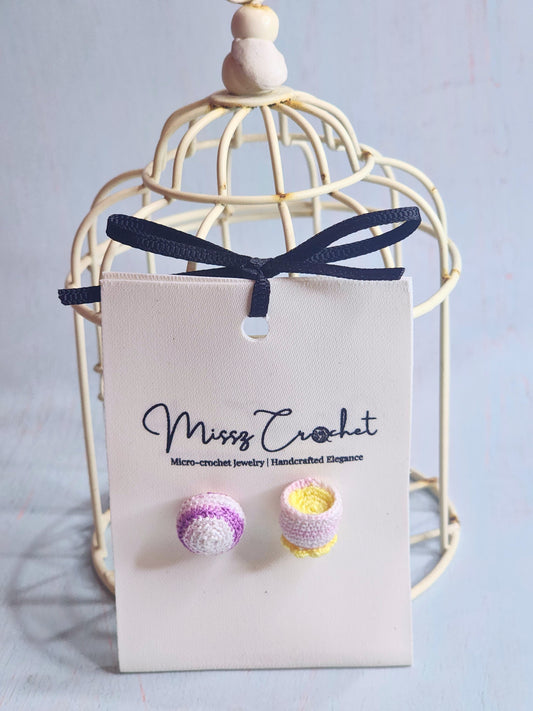 Handcrafted amigurumi earrings feature a micro-crochet taro pastry, and a teacup. Set with 18K gold-plated ear studs.