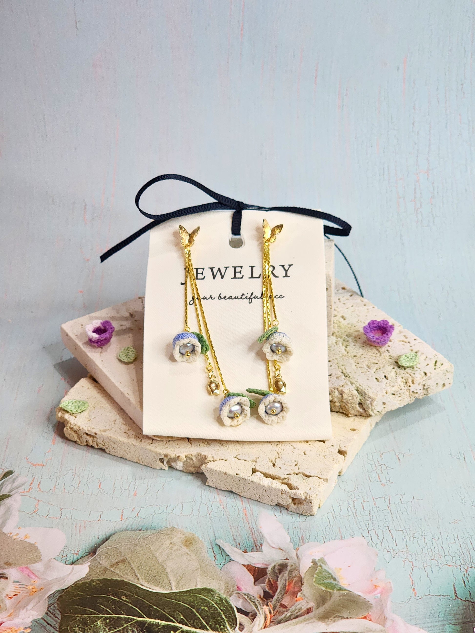 White-blue micro-crochet Lilies of the Valley with 4.5-5mm smoke grey freshwater pearls chandelier earrings, set with 18K gold-plated butterfly ear studs & findings.