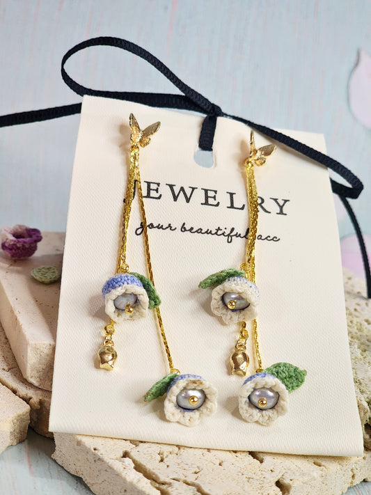 White-blue micro-crochet Lilies of the Valley with 4.5-5mm smoke grey freshwater pearls chandelier earrings, set with 18K gold-plated butterfly ear studs & findings.