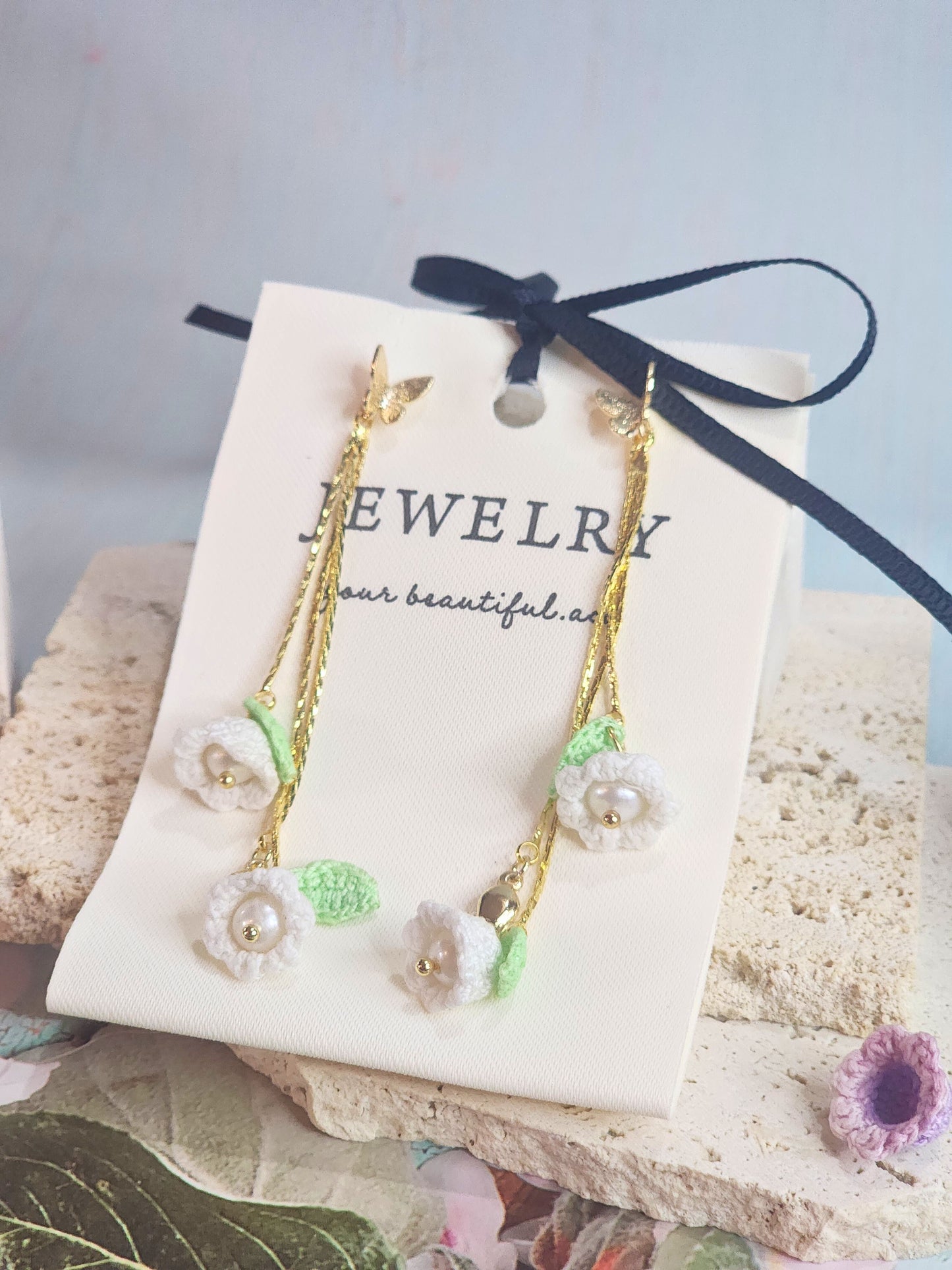 Handcrafted White lily of the Valley with freshwater pearls chandelier earrings, set with 18K gold-plated studs and findings.