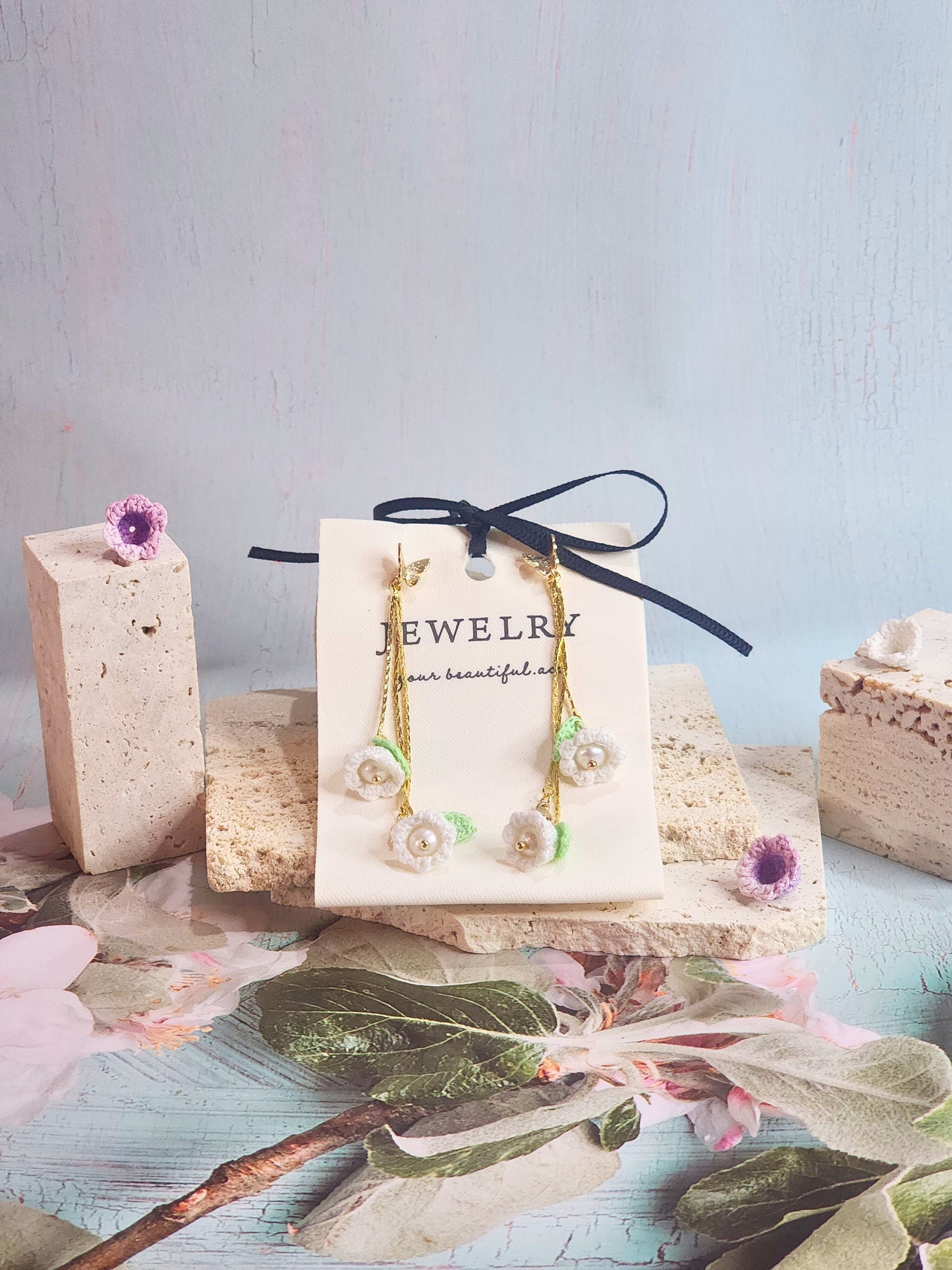 Handcrafted White lily of the Valley with freshwater pearls chandelier earrings, set with 18K gold-plated studs and findings.