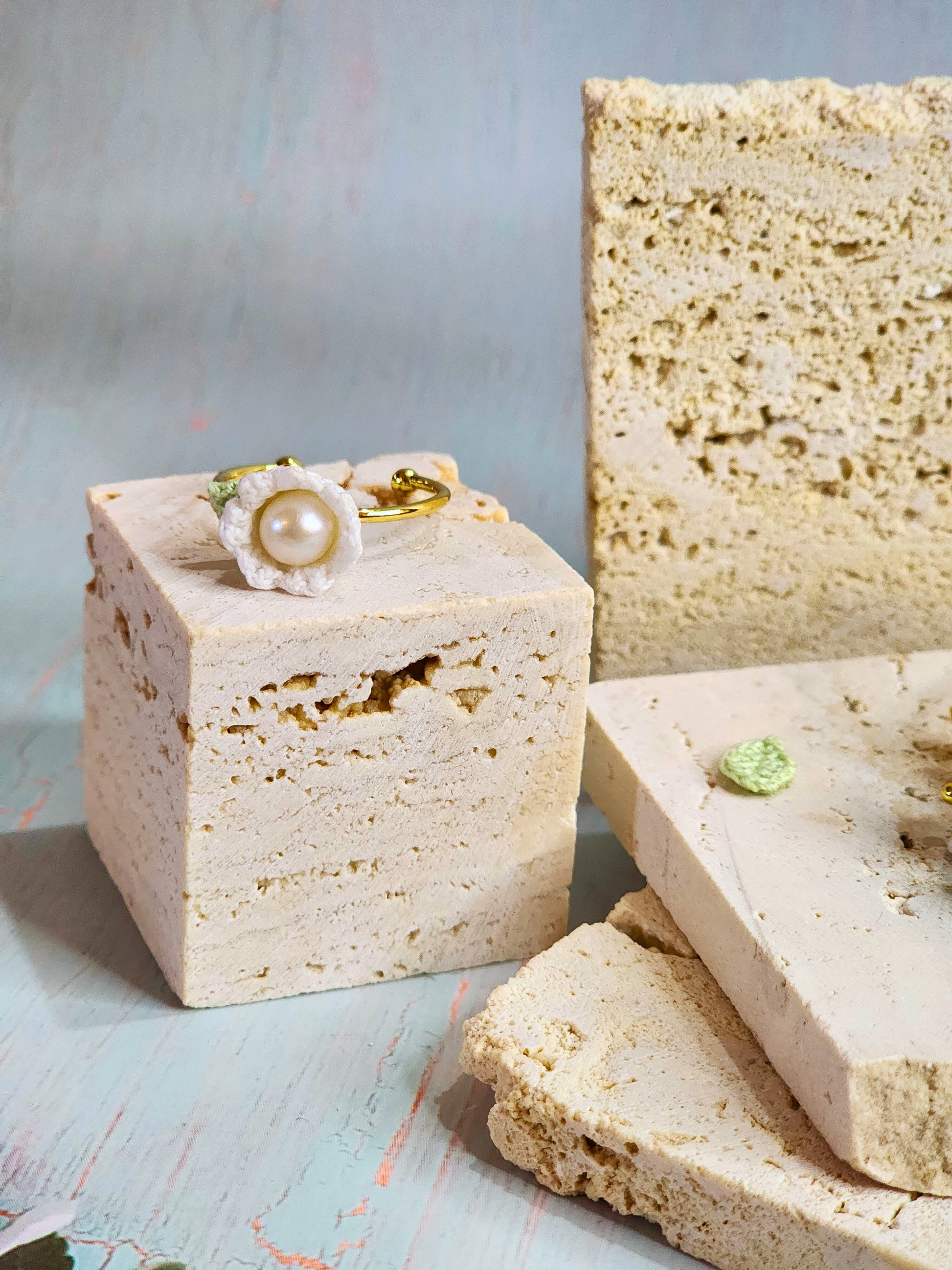 Handcrafted white micro-crochet Lily of the Valley with 6-7mm, nearly round, freshwater pearl ring on 18K gold-plated adjustable ring.