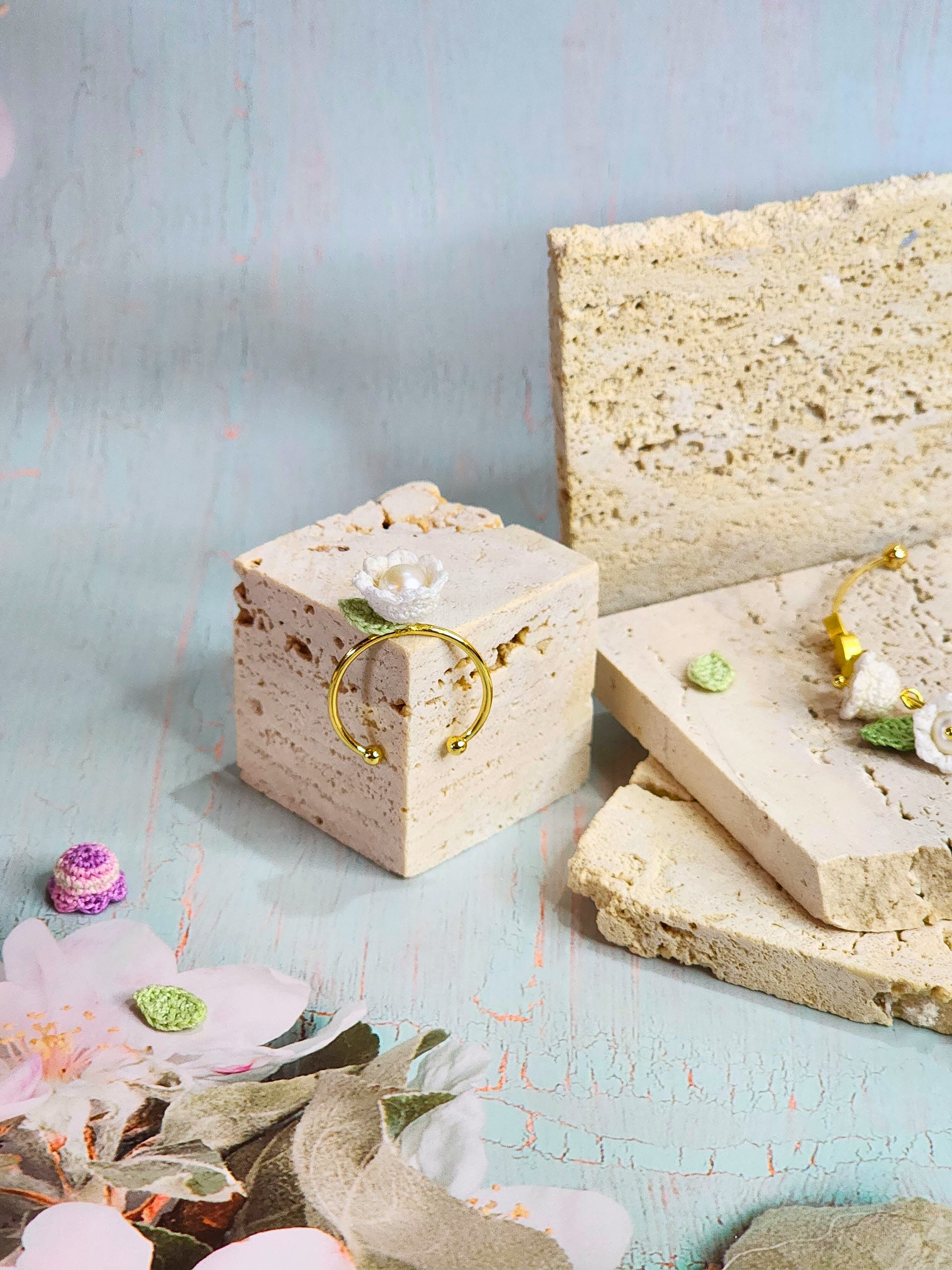 Handcrafted white micro-crochet Lily of the Valley with 6-7mm, nearly round, freshwater pearl ring on 18K gold-plated adjustable ring.