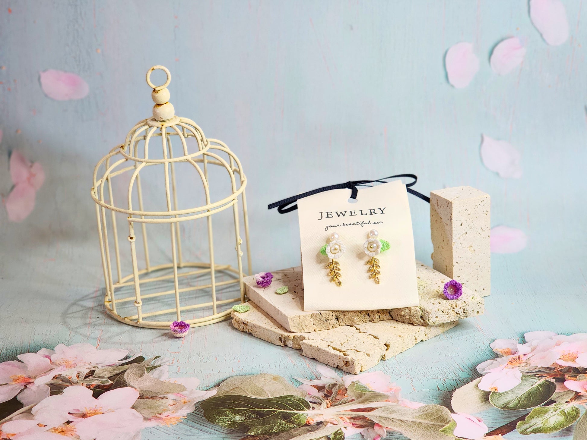 Handcrafted white micro-crochet Lily of the Valley with 4.5-5mm freshwater pearls earrings. 18K gold-plated enamel & zircon leaves.