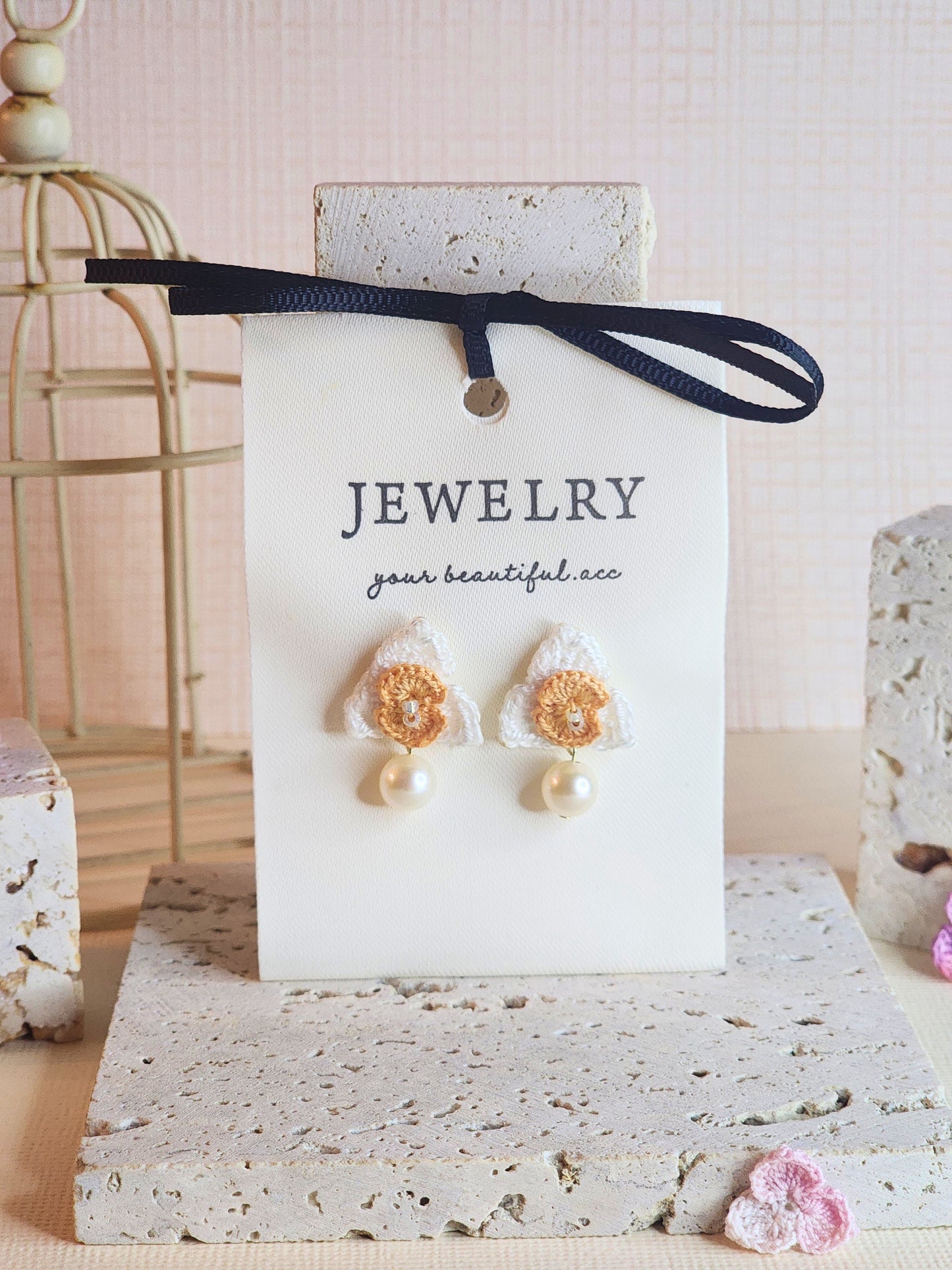 White Orchid micro-crochet earrings adorned with 7mm translucent natural freshwater pearl