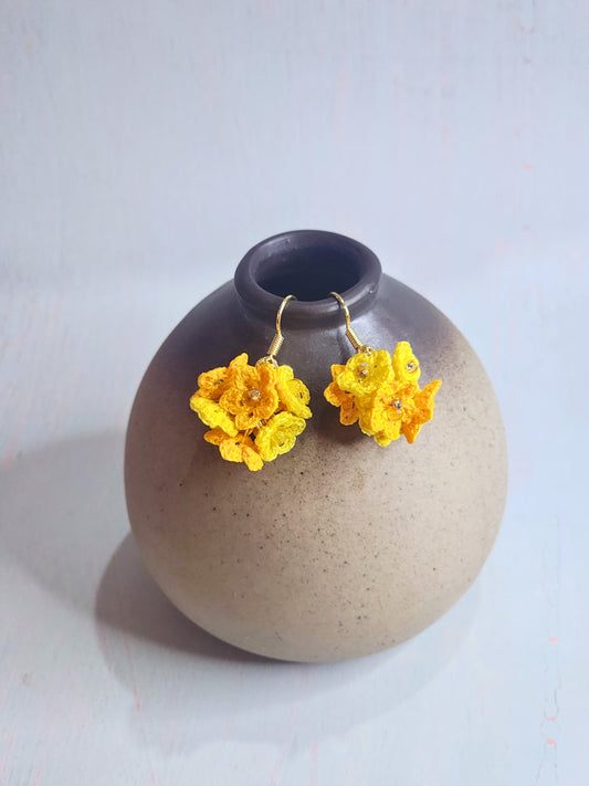 Handcrafted cluster of yellow & orange micro-crocheted star flower earrings. Lightweight and elegant design accented with Miyuki glass beads from Japan.