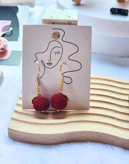 Pair of handcrafted micro-crochet earrings made with ultra-fine lace yarn and 18K gold-plated leaf and findings
