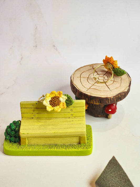 Handcrafted micro-crochet yellow sunflower ring. 18K gold-plated adjustable band. 