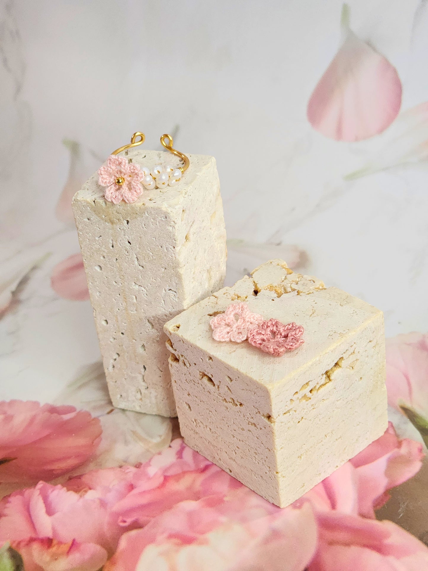 Band of natural freshwater pearls ring adorned with a delicately handcrafted micro‑crochet Sakura. 18K gold-plated adjustable ring.