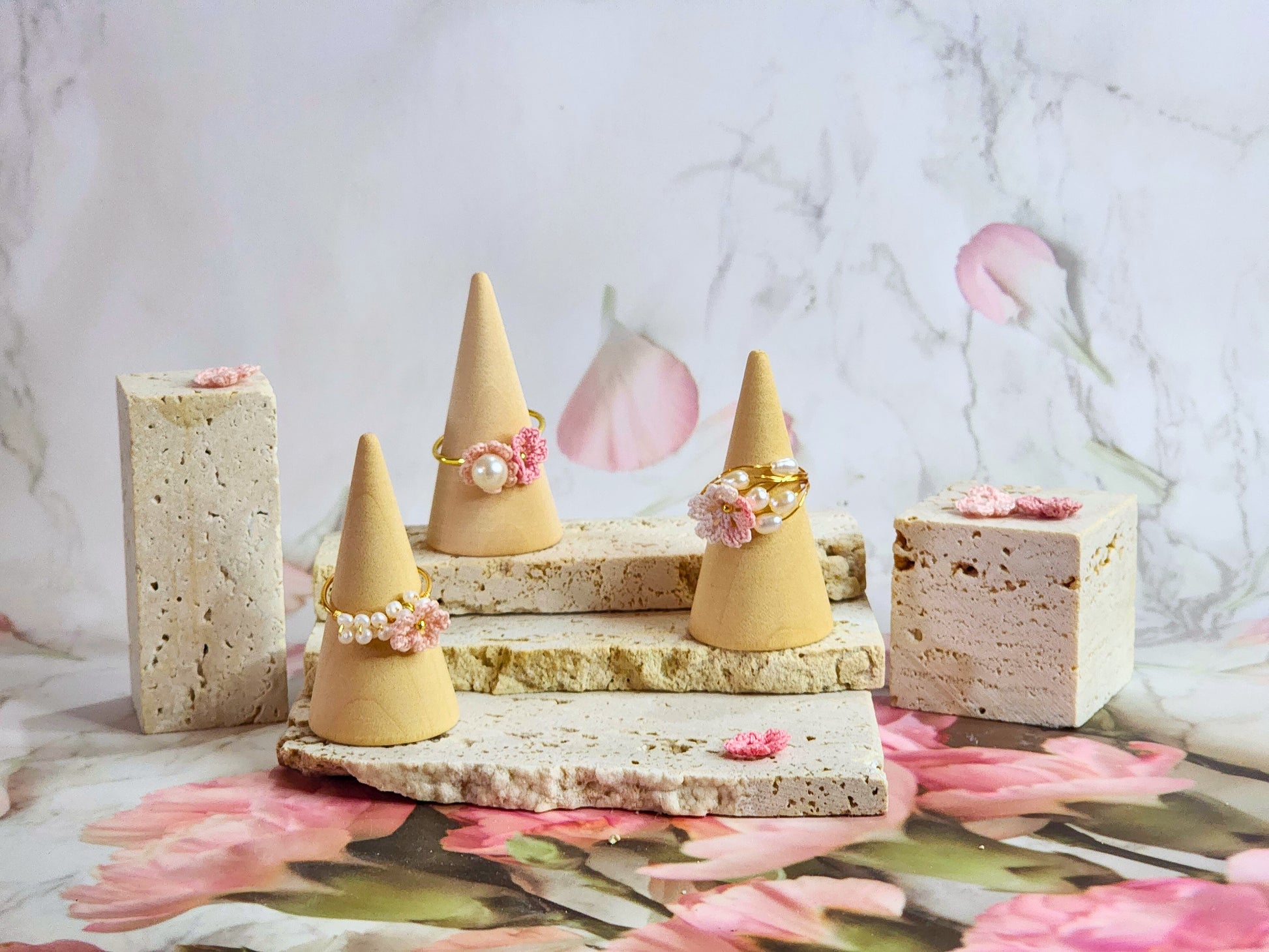 Collection of natural freshwater pearl rings featuring delicately handcrafted micro‑crochet Sakura. 