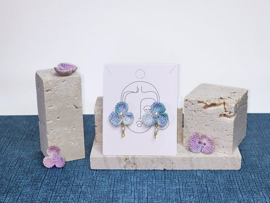 A pair of Pansy with Pearl Beads Micro-crochet Earrings