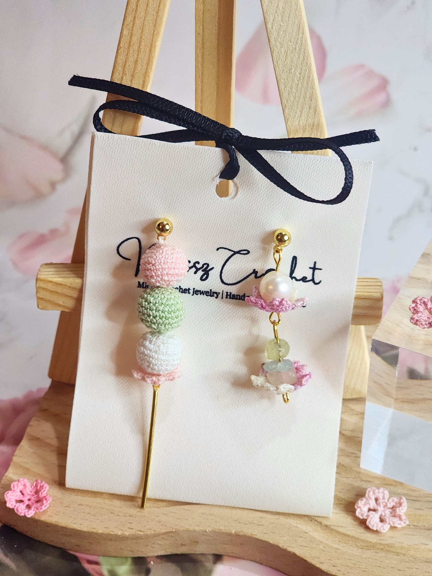 Handcrafted asymmetrical Dango & Sakura micro-crochet earrings. Adorned with natural freshwater pearl and morganite crystals 