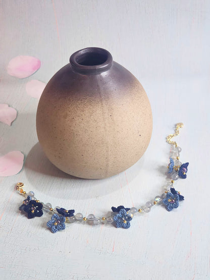 Natural Labradorite Crystals bracelet with blue micro-crochet start flowers in two shades of blue. Accented with Miyuki glass beads from Japan.