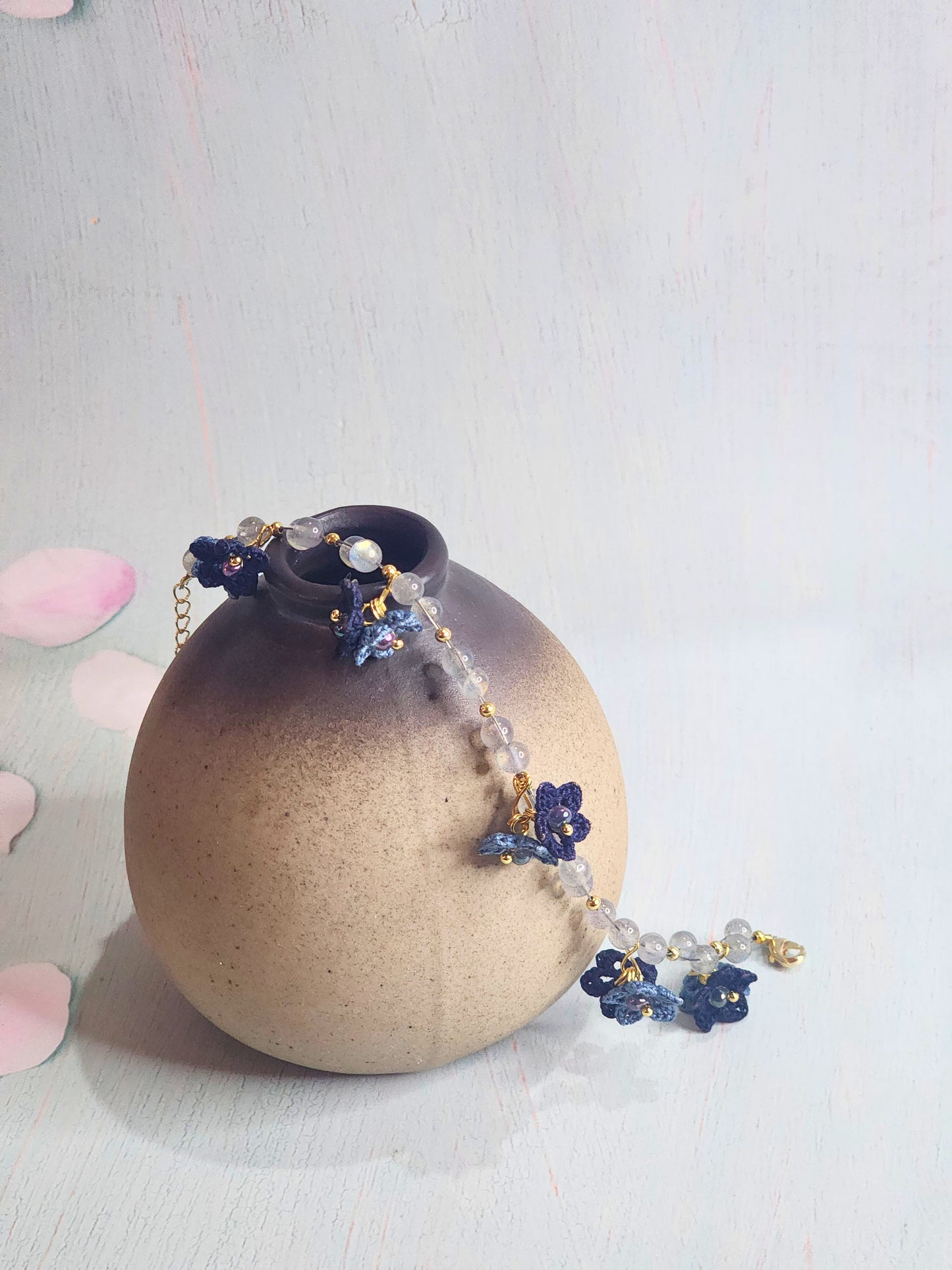 Natural Labradorite Crystals bracelet with blue micro-crochet start flowers in two shades of blue. Accented with Miyuki glass beads from Japan.