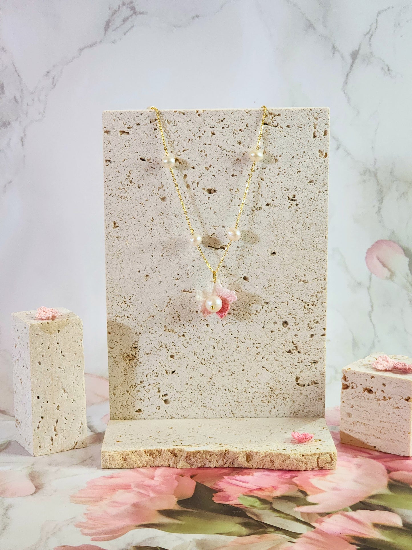 Freshwater Pearls Choker with Micro-crochet Sakura & Pearl pendant. Handcrafted and paired with an 18K gold-plated chain.   