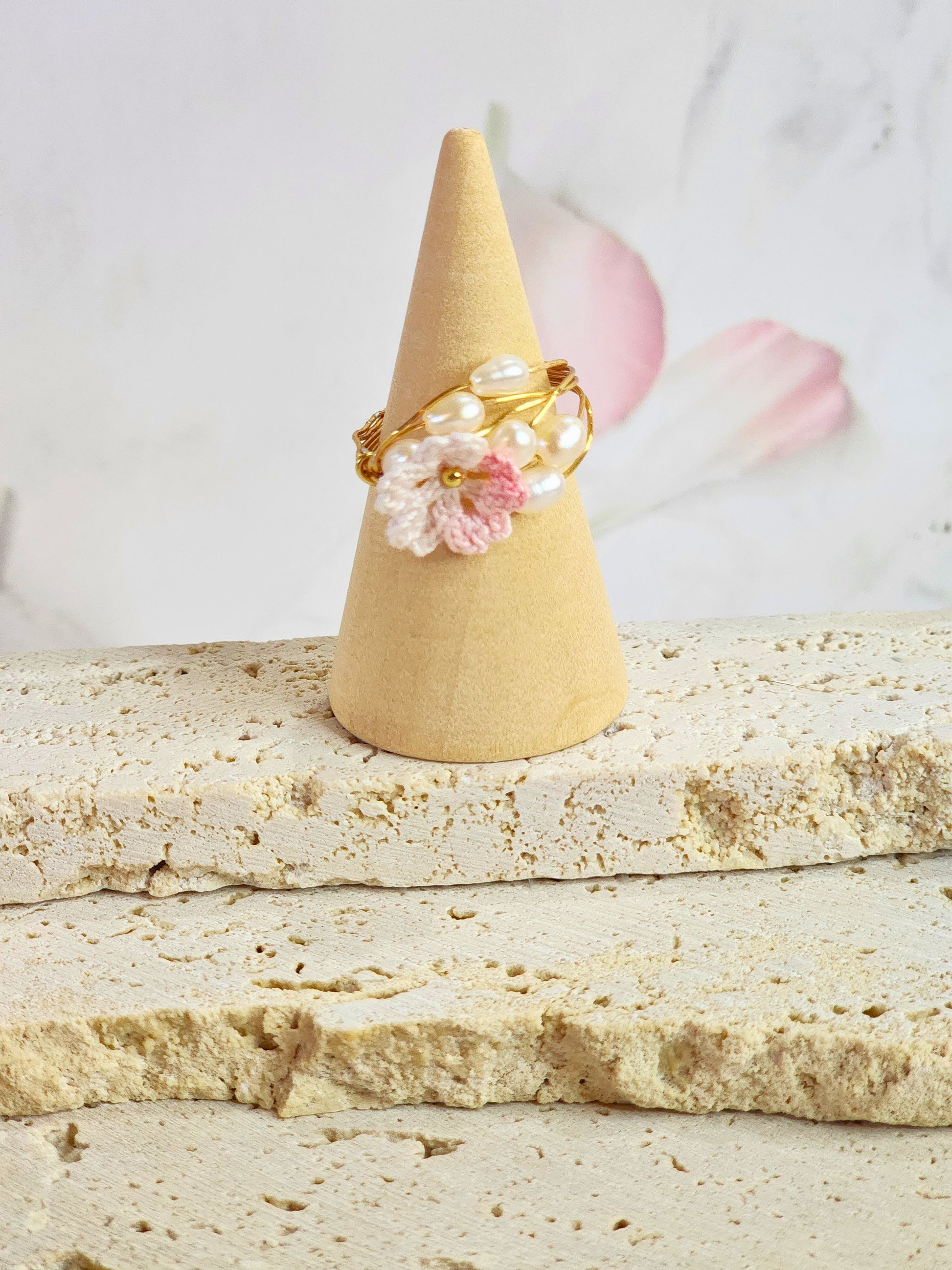 Exquisite ring of natural Baroque pearls adorned with a pink-white handcrafted micro-crochet Sakura 