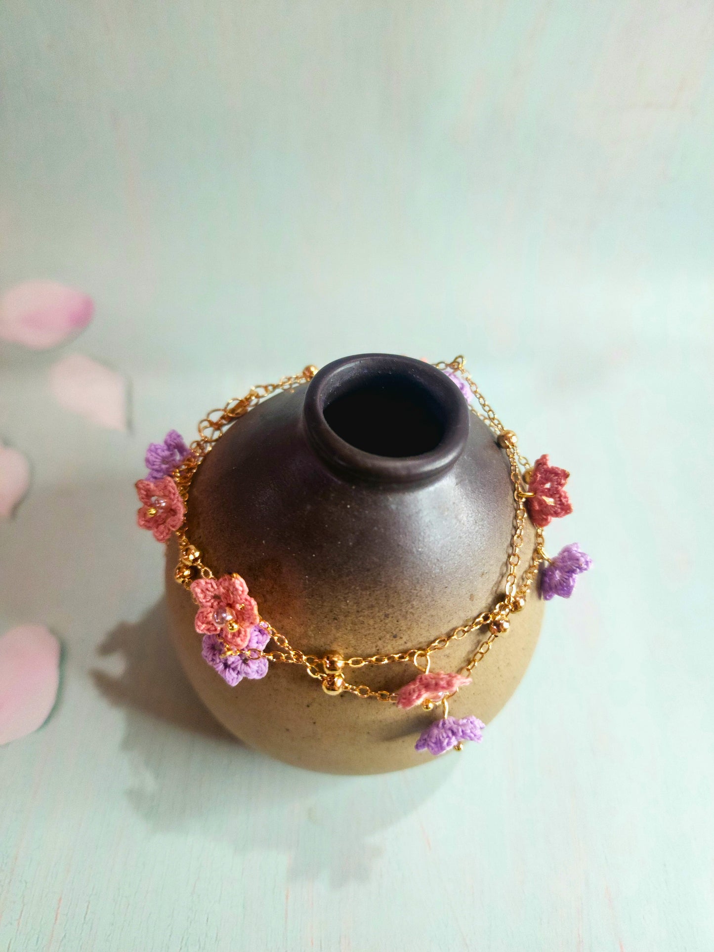 Pink & purple micro-crochet star flowers accented with Miyuki glass beads on double strand 18K gold-plated bracelet