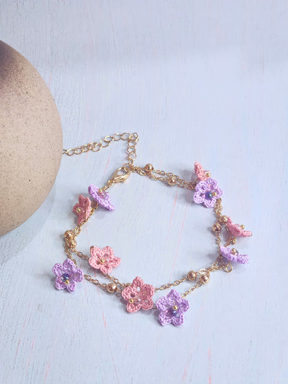 Pink & purple micro-crochet star flowers accented with Miyuki glass beads on double strand 18K gold-plated bracelet