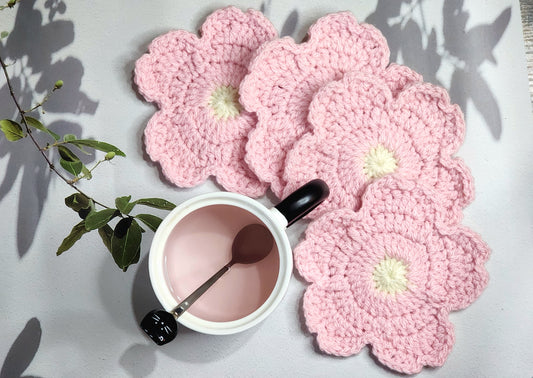 Set of 4 pink sakura crochet coasters