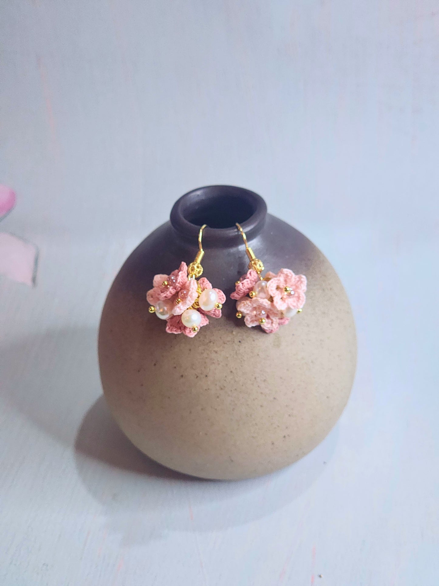 Handcrafted cluster of pink & mauve micro-crocheted star flower earrings. Lightweight and elegant design accented with Miyuki glass beads from Japan.