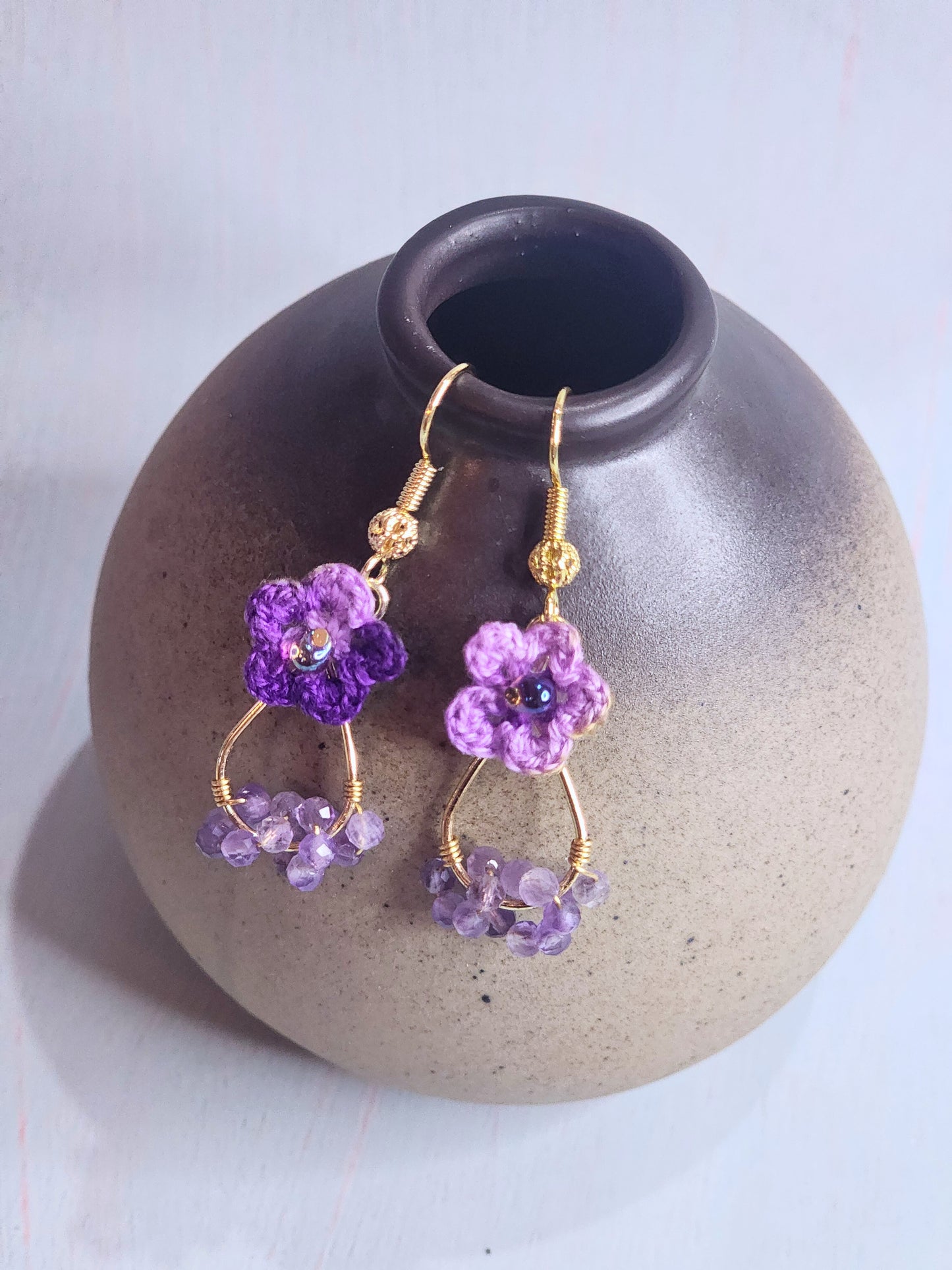 Handcrafted micro-crochet star flowers earrings with natural Amethyst crystals and Miyuki glass beads from Japan. 18K gold-plated ear hooks.