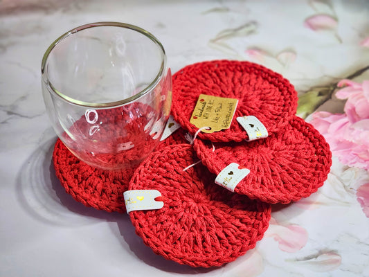 Set of 4 red polyester crochet coasters