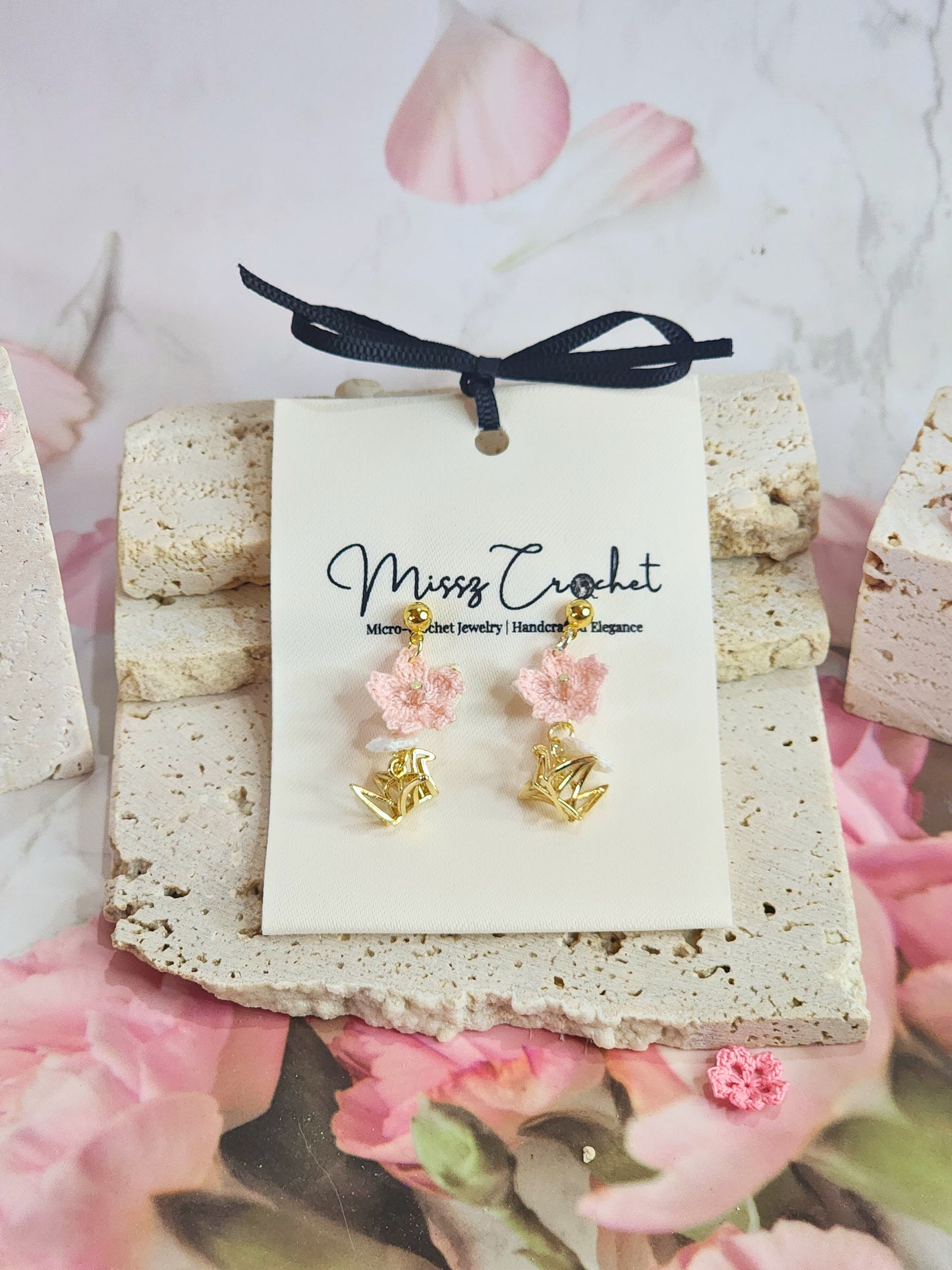 Handcrafted micro-crochet Sakura blossoms accented with Czech Crystals and gold-plated cranes on 18K gold-plated ear studs