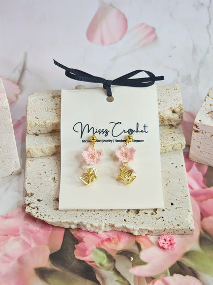 Handcrafted micro-crochet Sakura blossoms accented with Czech Crystals and gold-plated cranes on 18K gold-plated ear studs